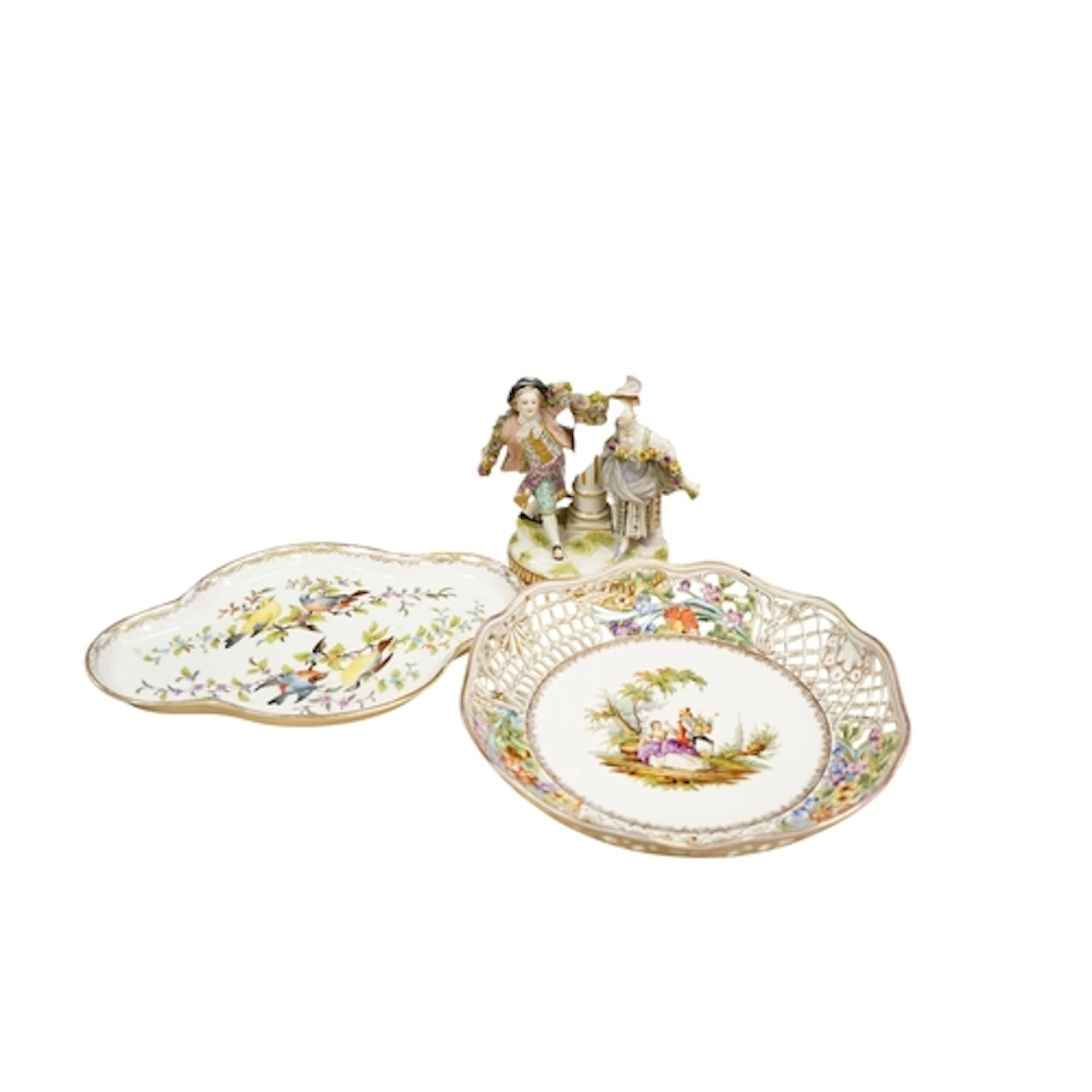 A Ludwigsburg style porcelain group, a reticulated Dresden p...