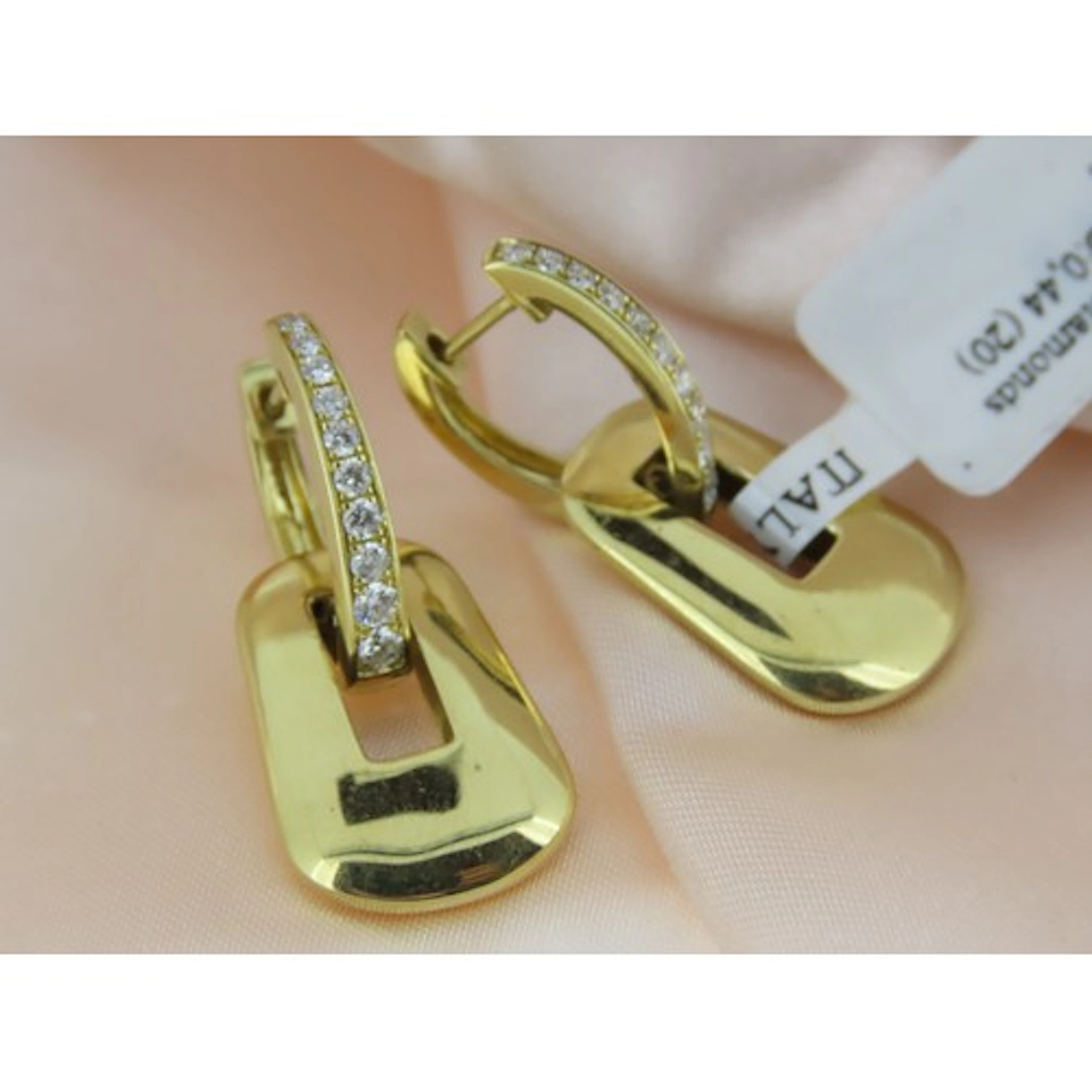 Pair of Attractively Detailed, Diamond Channel Set Bold Link...
