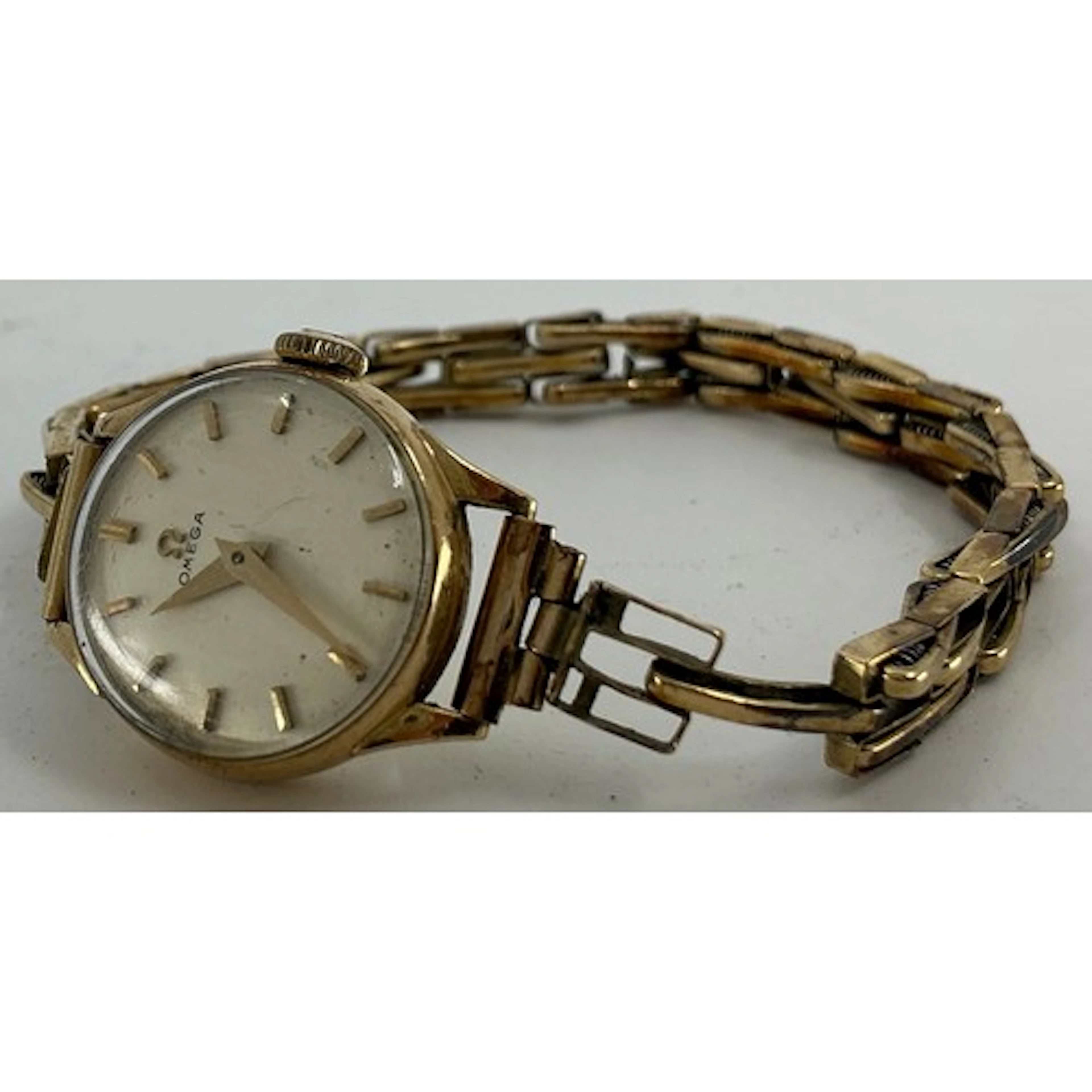 Omega - a ladies 9ct gold cased bracelet wristwatch, ref 950...