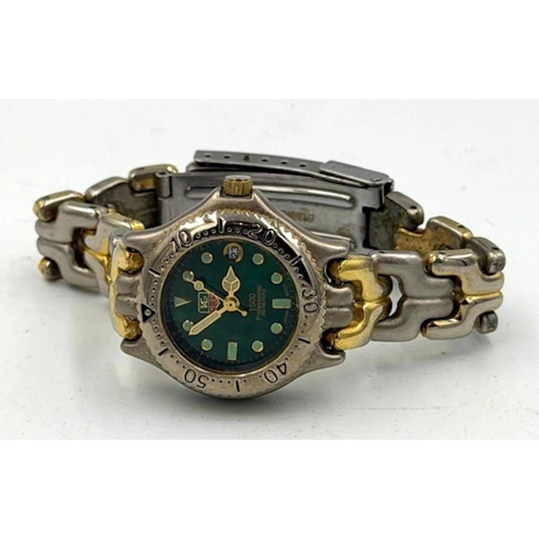 A TAG Heuer Professional 1500 series with green sunburst sty...