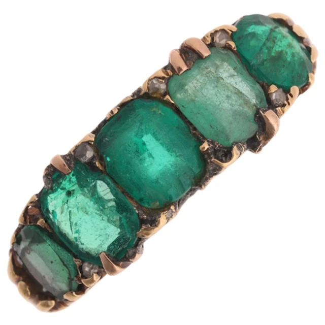 An Antique 18ct gold five stone emerald half hoop ring, set ...