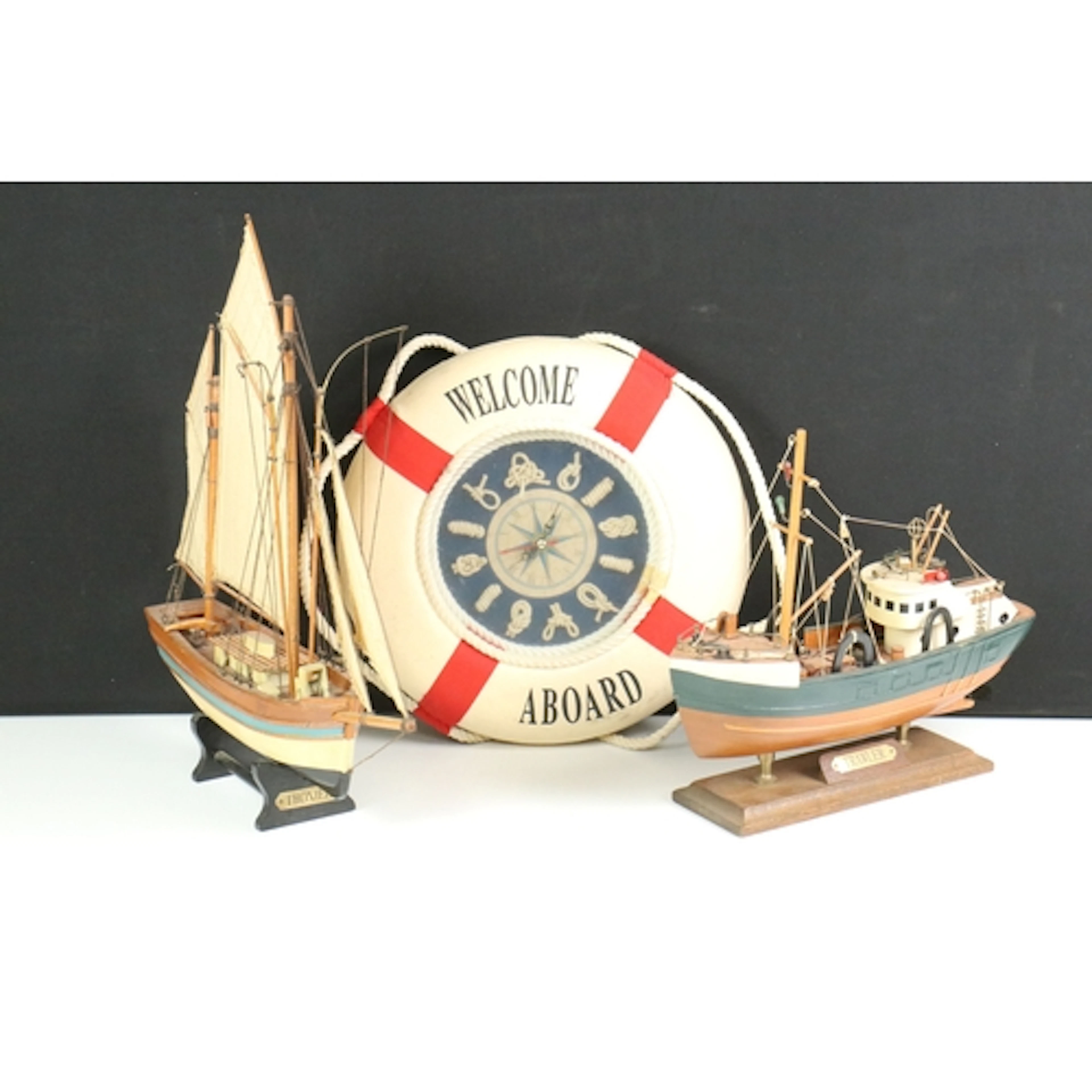 Two models of sailing boats, both having painted bodies, rai...