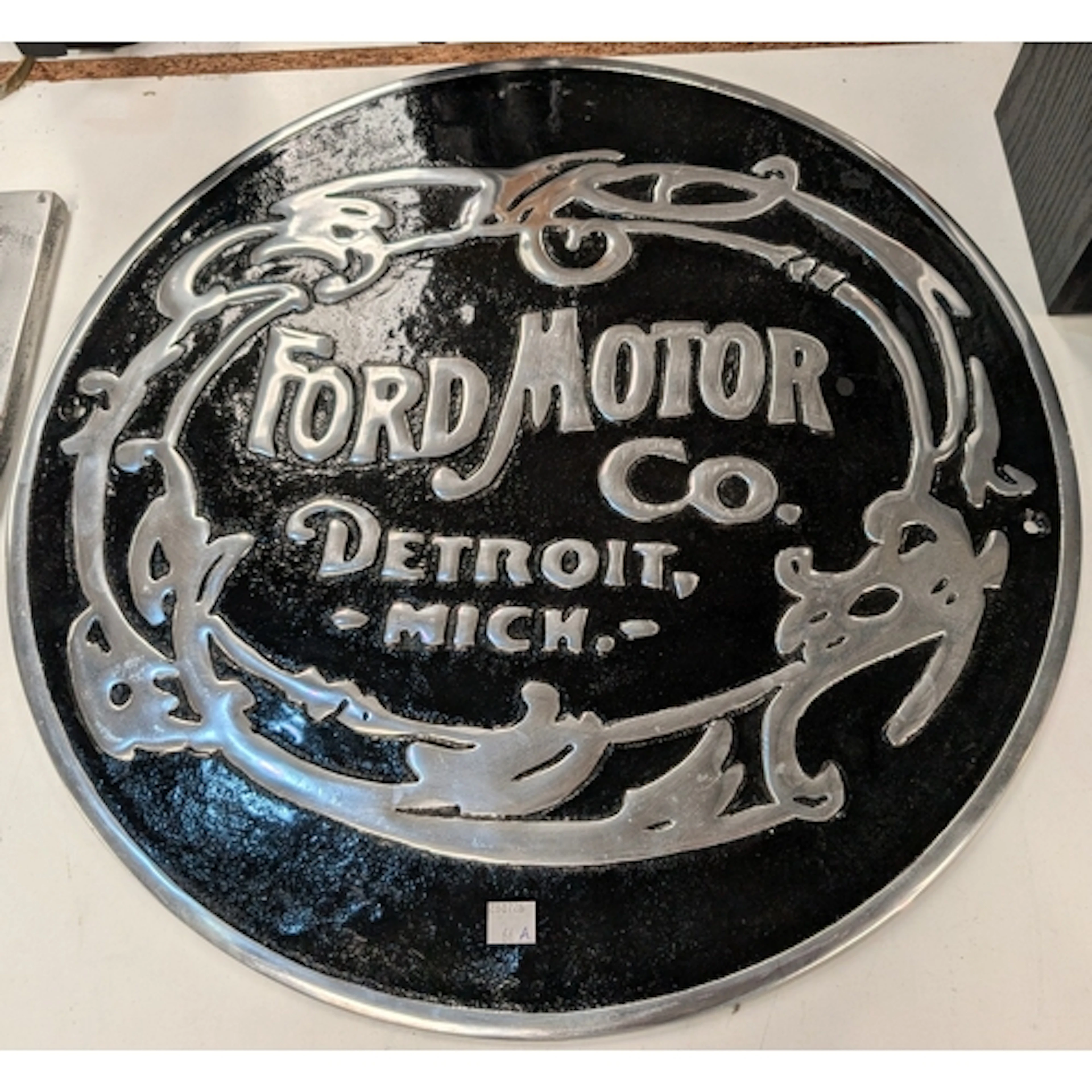 Vintage tin Ford Motor Co. enamelled tin wall plaque.