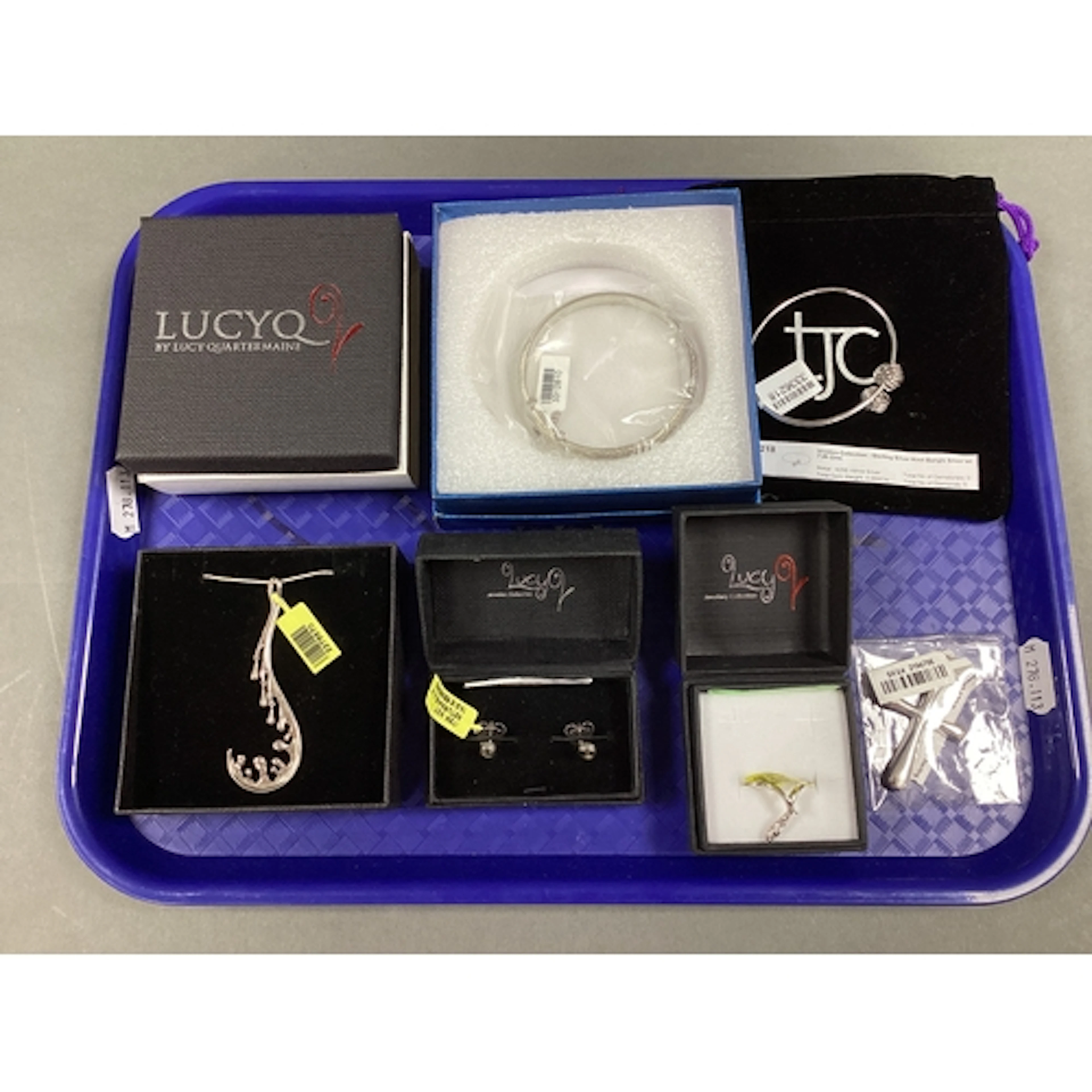 Lucy Q; An Abstract Style Droplet Pendant, of curved design,...