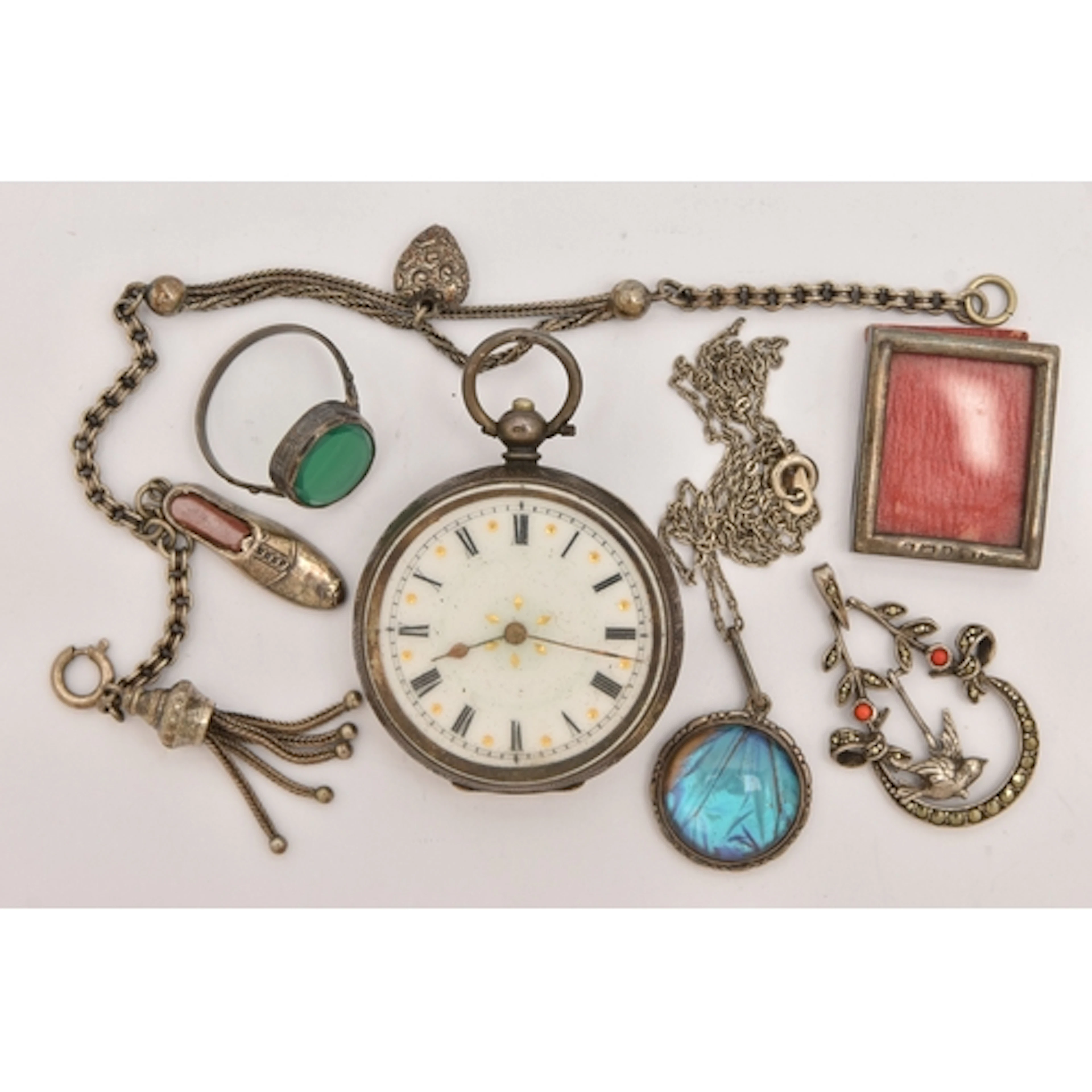 A SMALL ASSORTMENT OF JEWELLERY, to include a white metal bu...