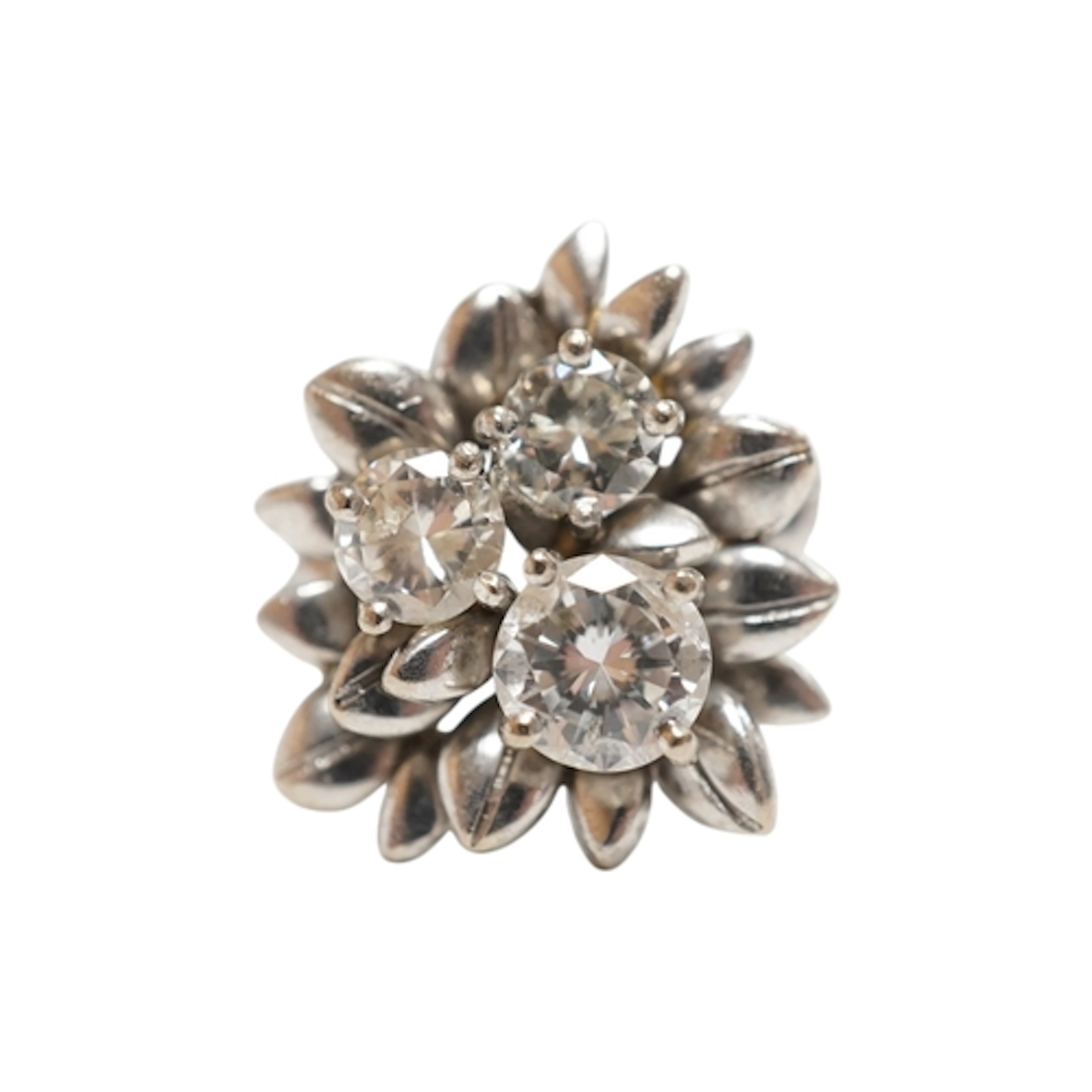 A diamond cocktail ring, 1970s, claw-set with three brillian...