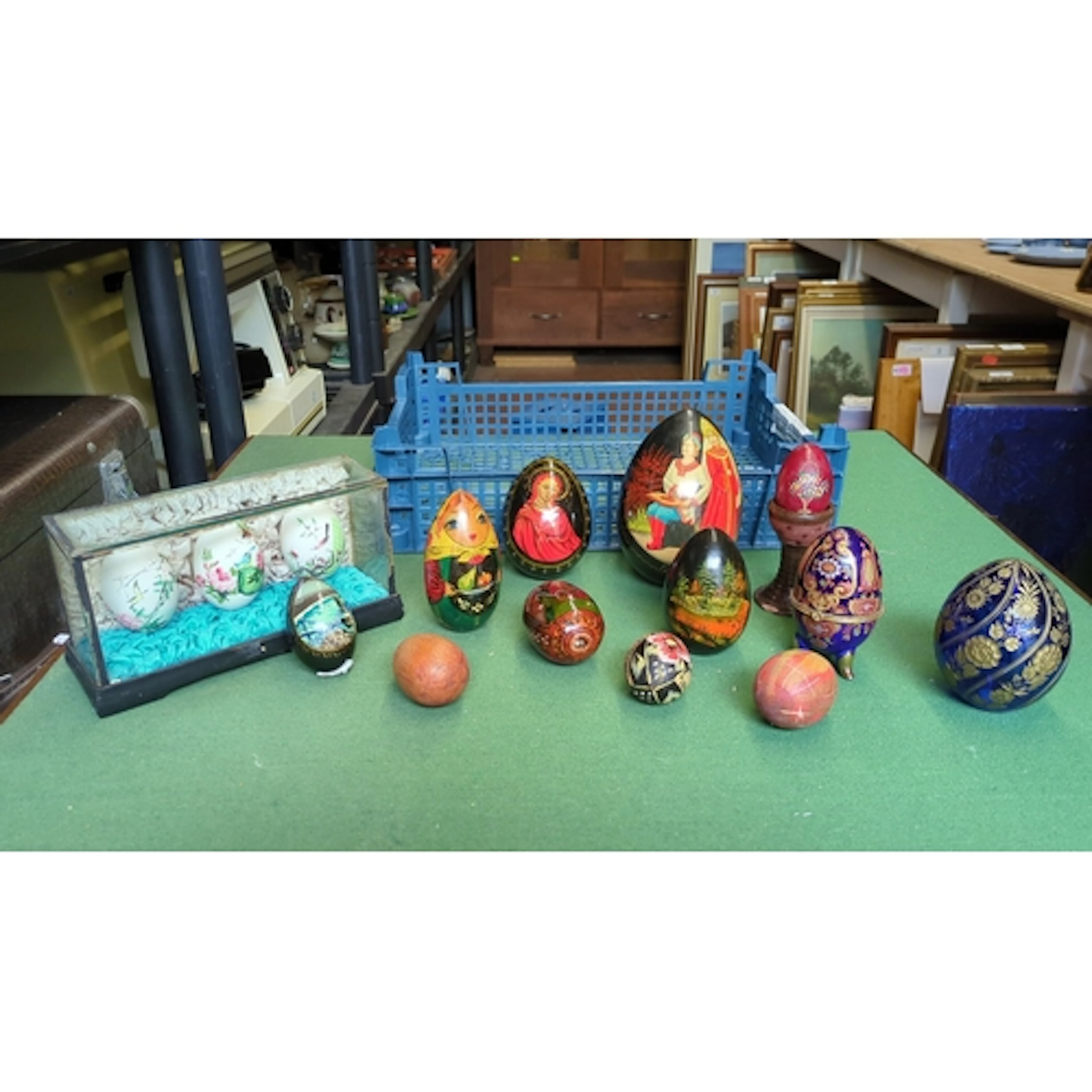 A quantity of decorative eggs and egg-form objets, comprisin...