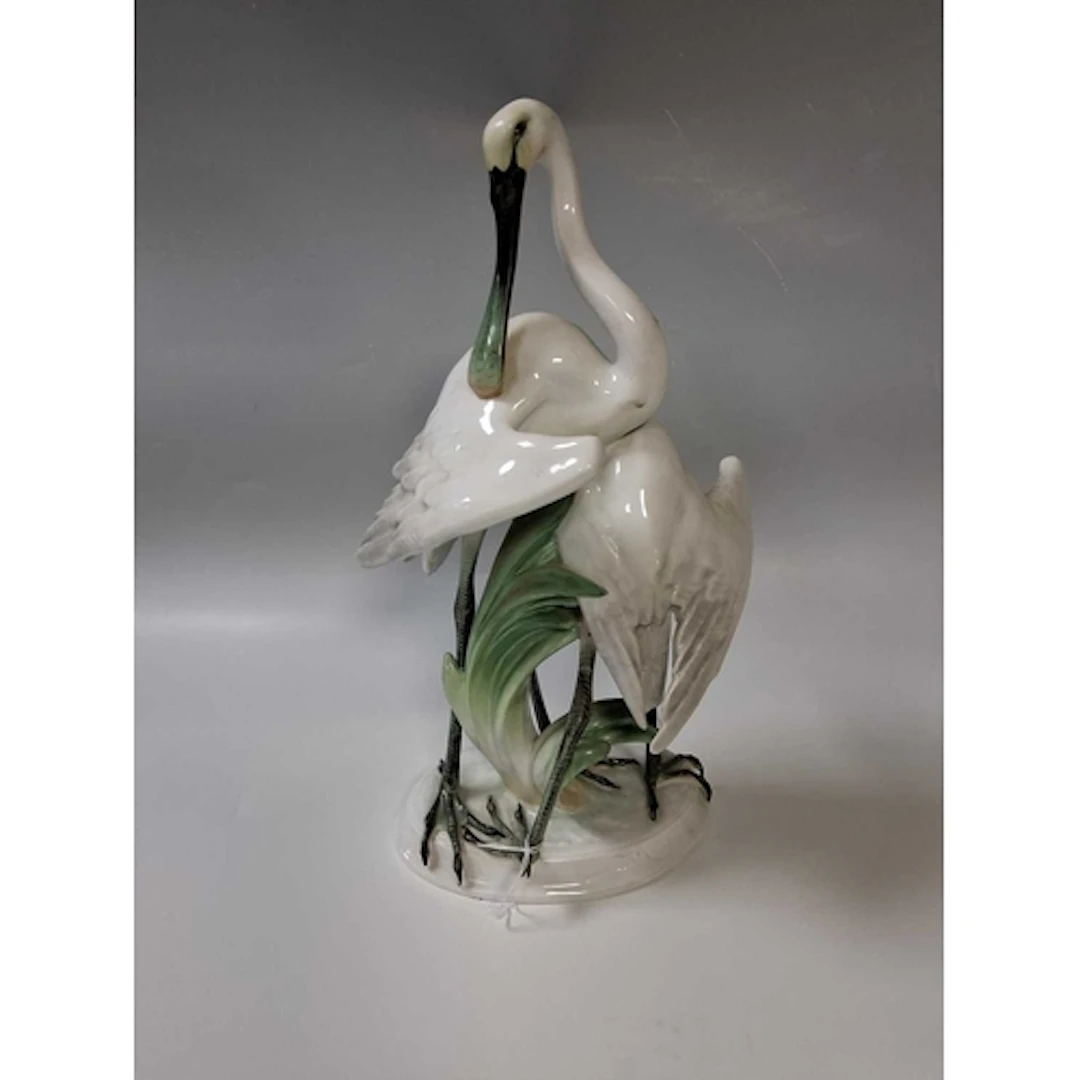 A LARGE HEREND HAND-PAINTED PORCELAIN GROUP OF TWO SPOONBILL...