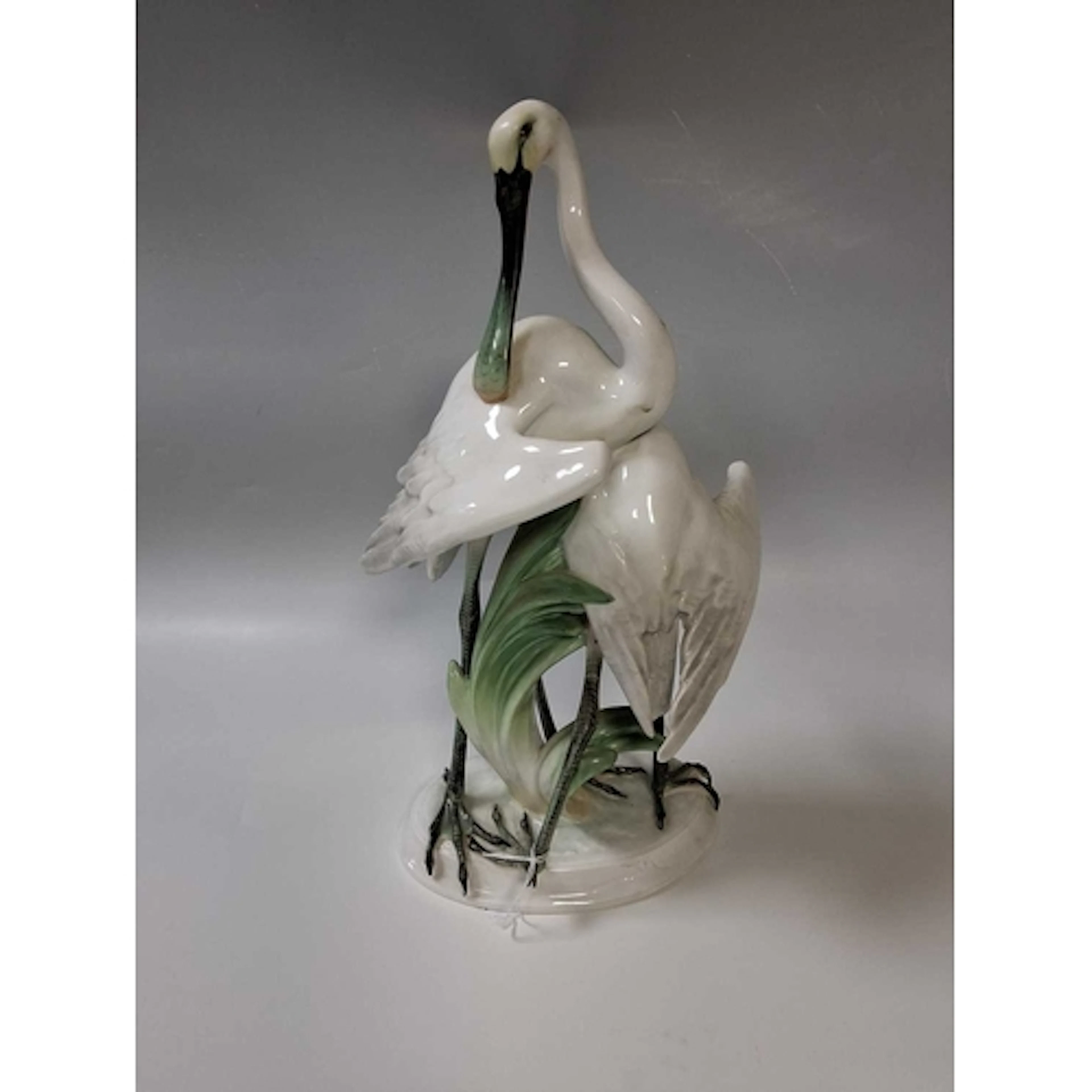 A LARGE HEREND HAND-PAINTED PORCELAIN GROUP OF TWO SPOONBILL...