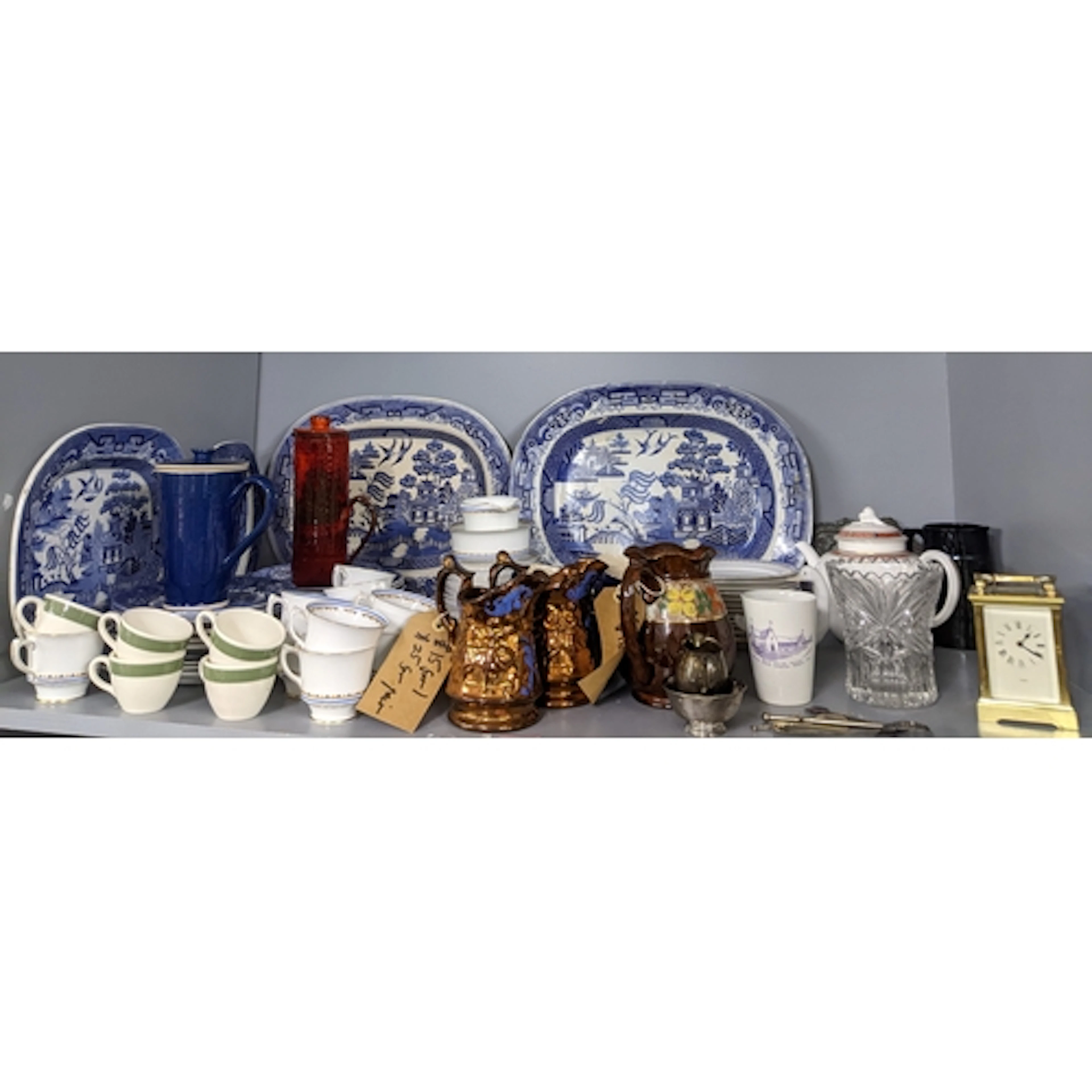 A mixed lot of mainly ceramics to include willow pattern blu...
