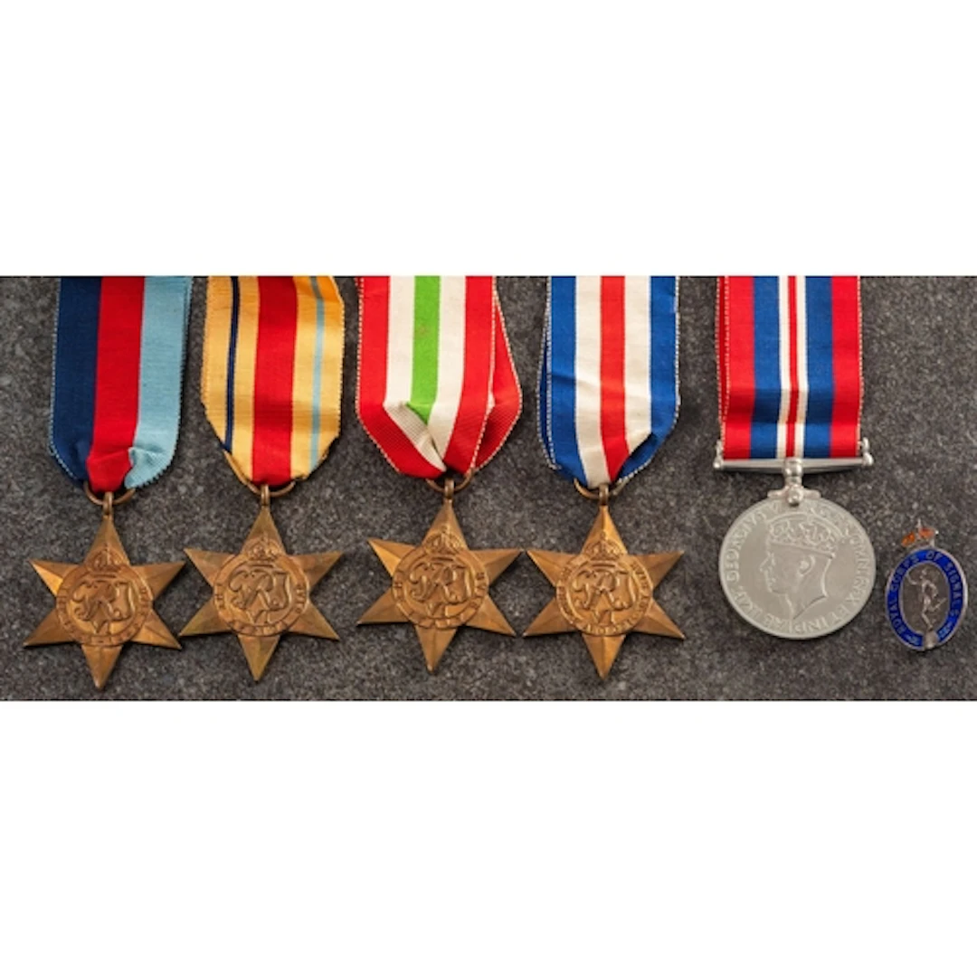 A WWII group of five medals. Comprising a 1939-45 Star, Afri...