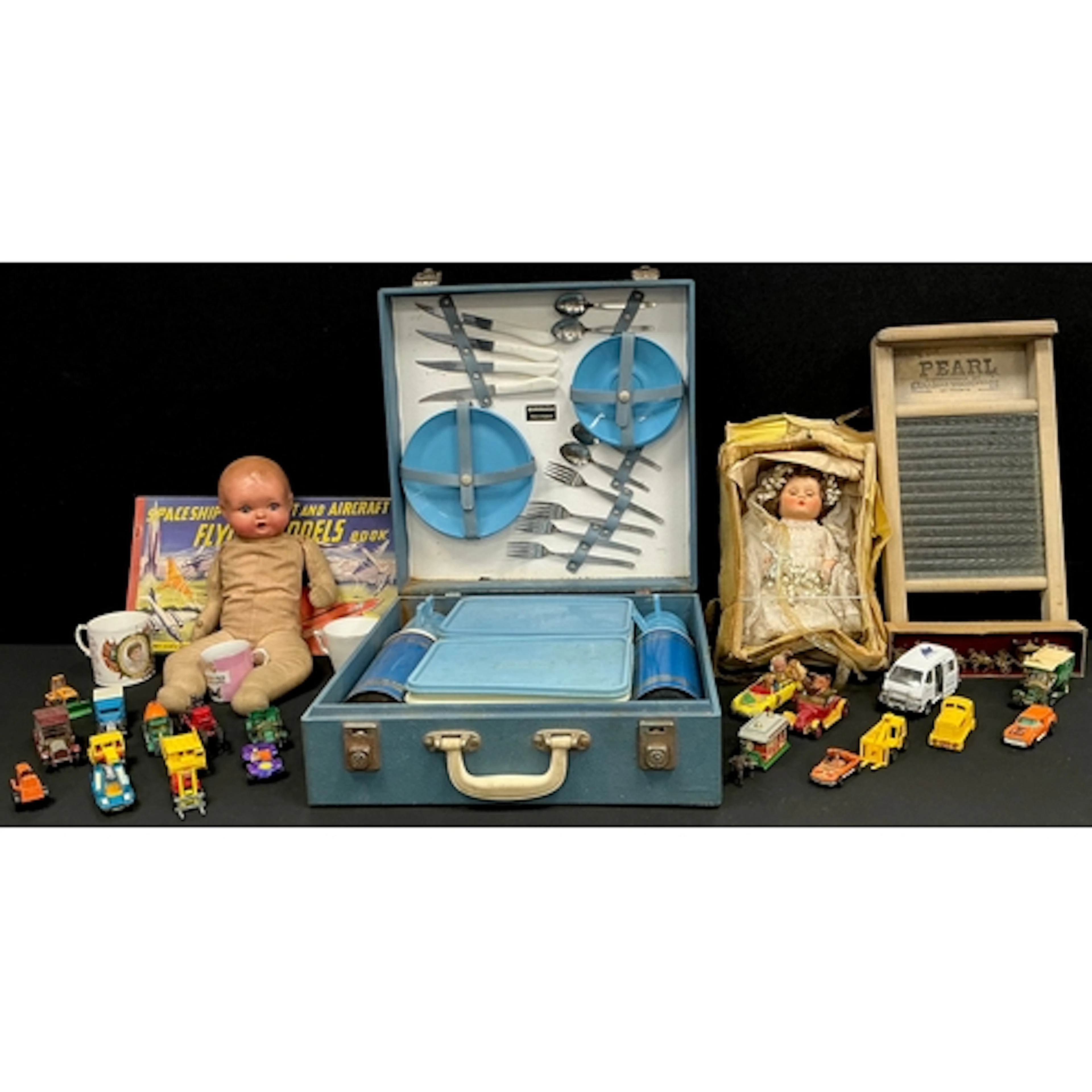 A mid century Sirram picnic basket in blue, opening to revea...