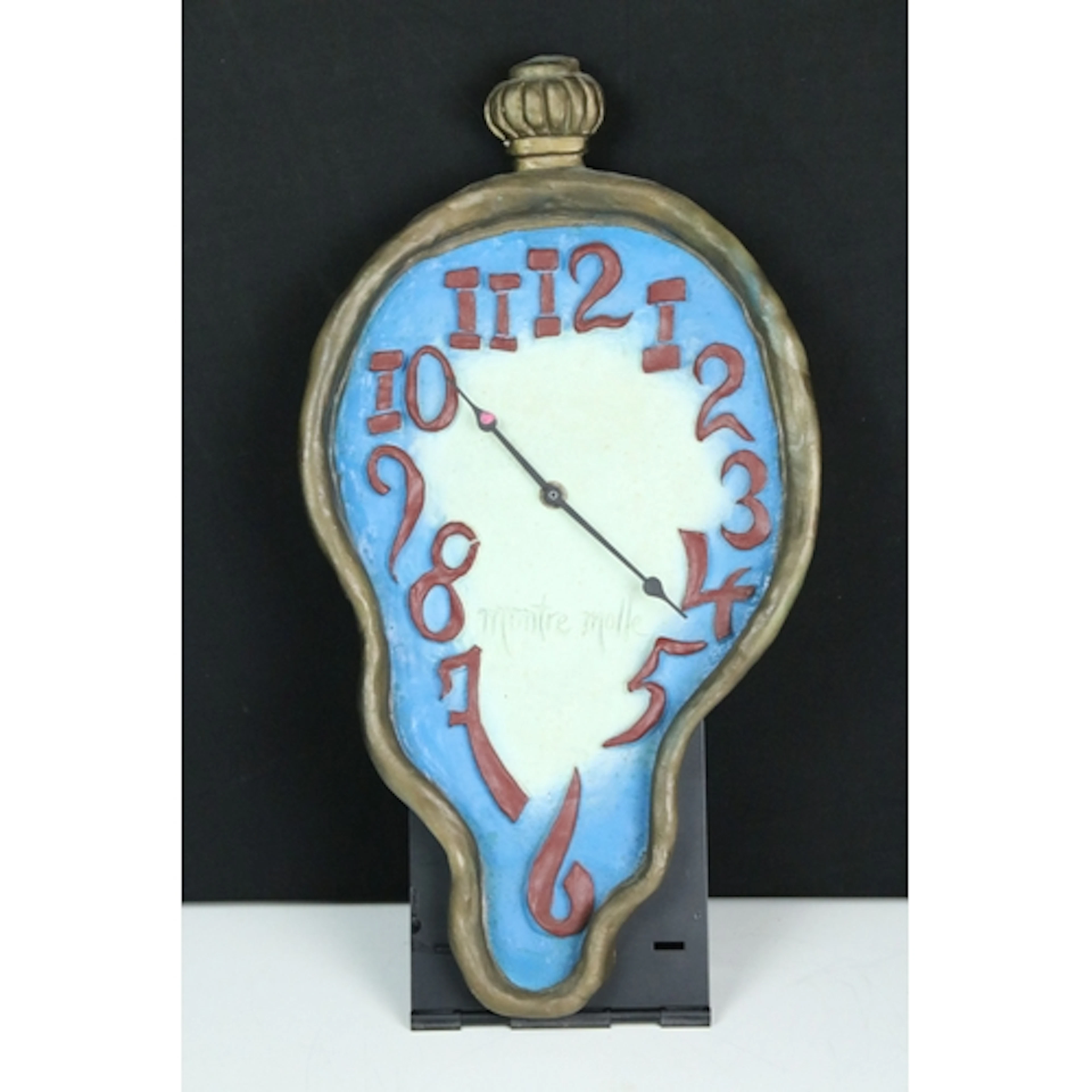 On The Wall Productions clock in the manner of Salvador Dali...