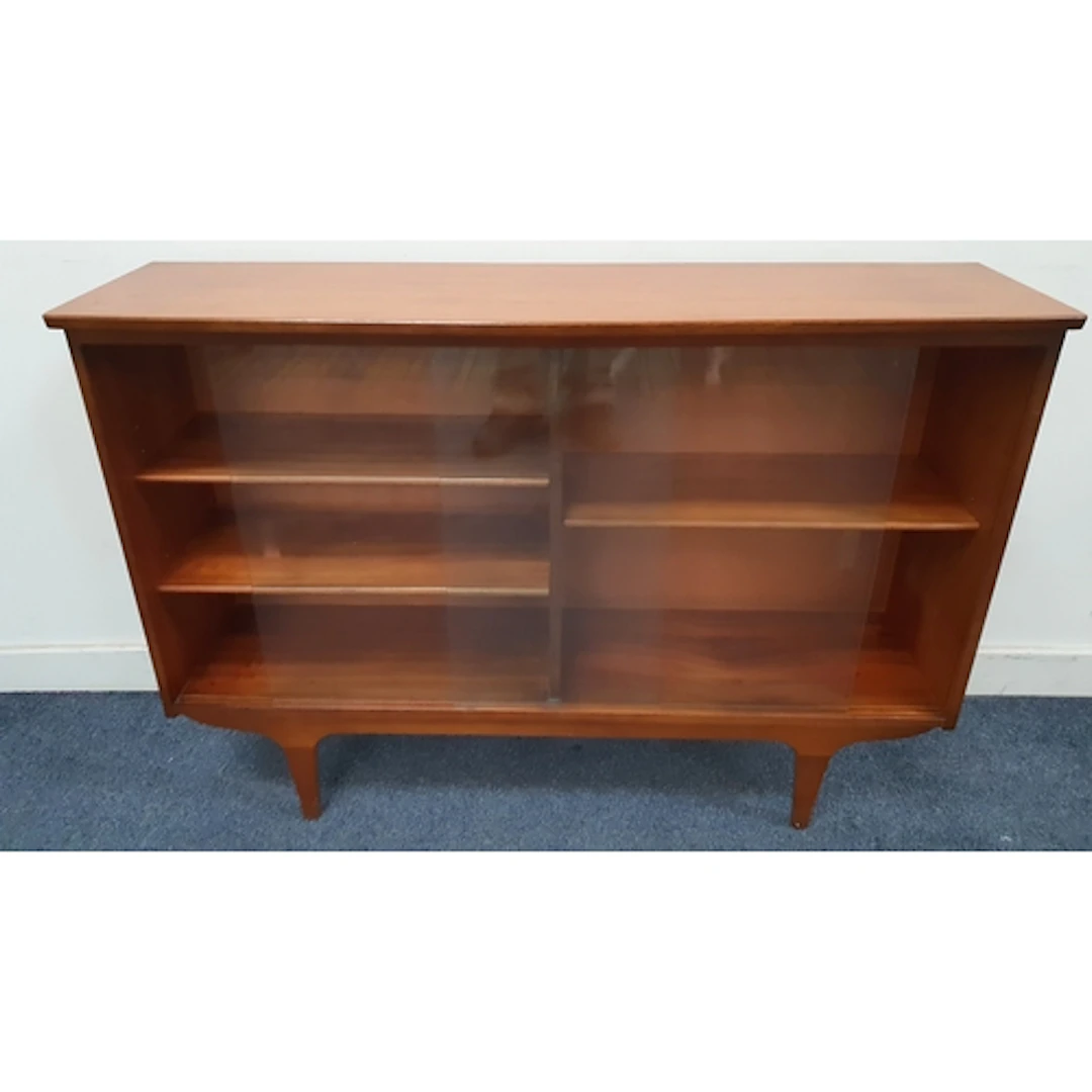 MID-CENTURY TEAK DISPLAY CABINET featuring front bowed rect...