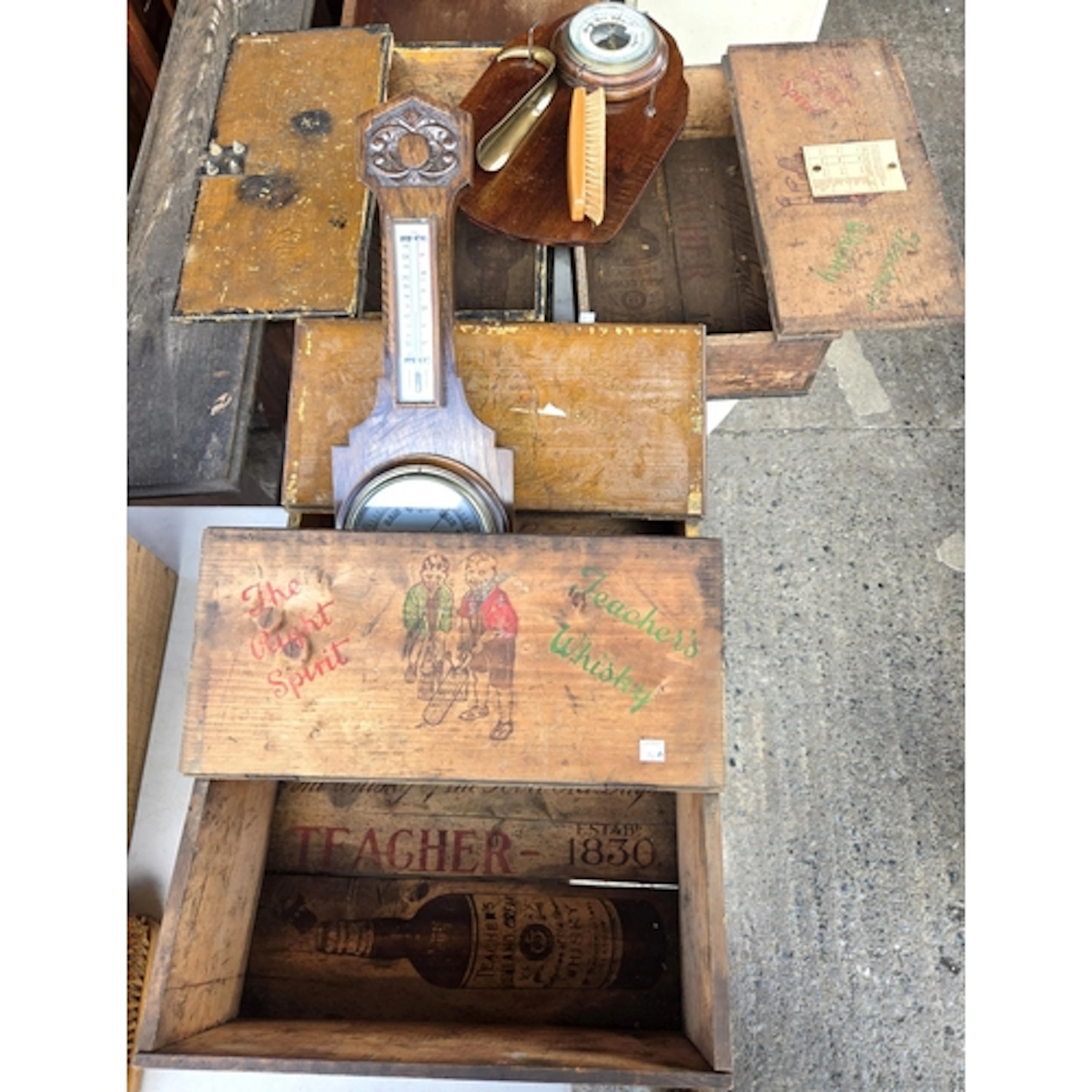 An android barometer, another with brush and horn and a coll...