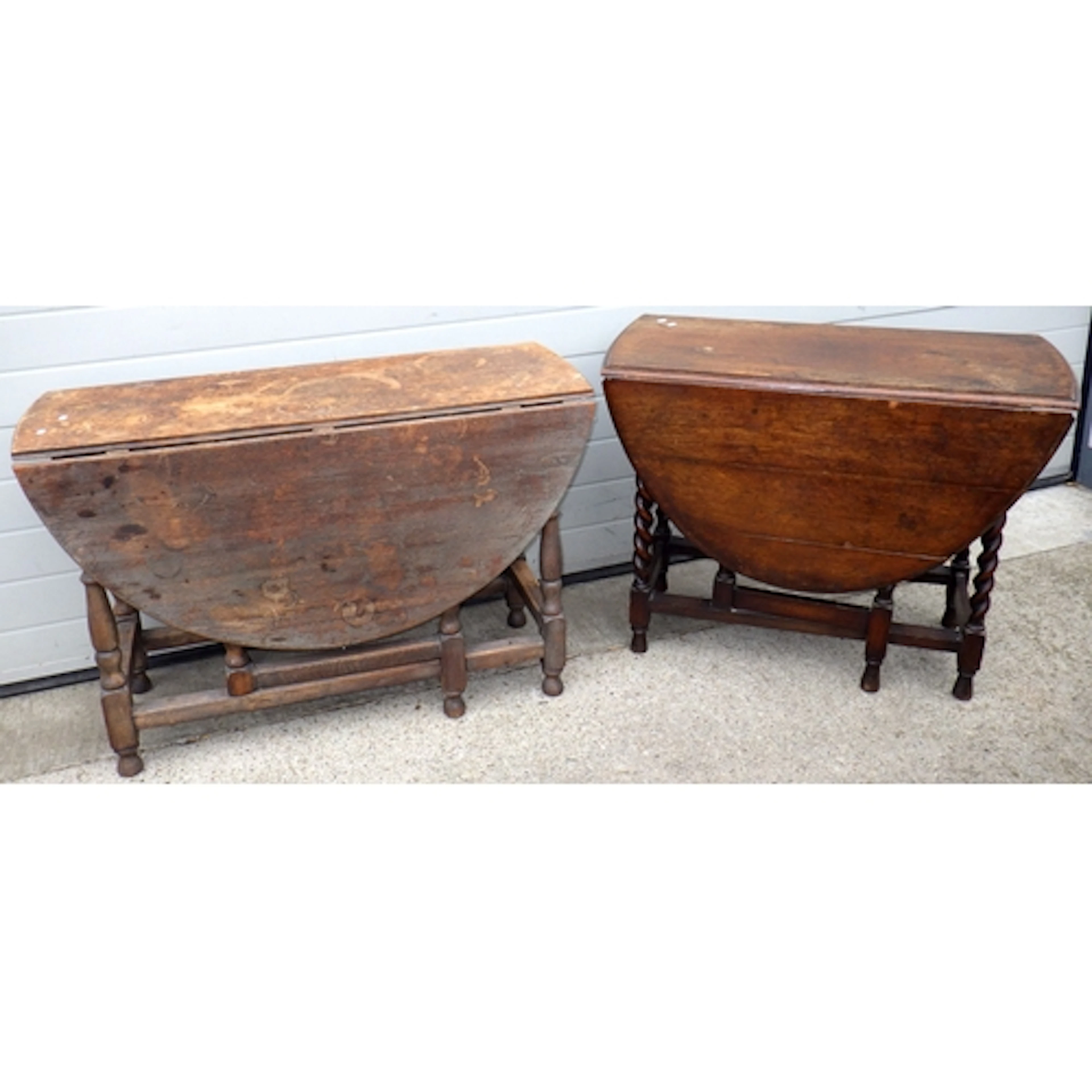 A 1930's barleytwist oak gateleg table together with another...
