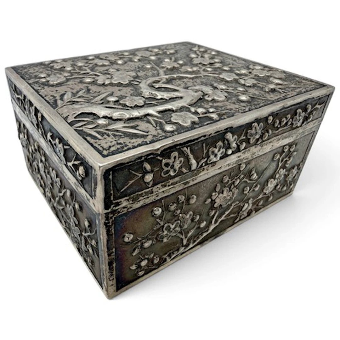 A Chinese export silver box, the piano hinged cover and side...