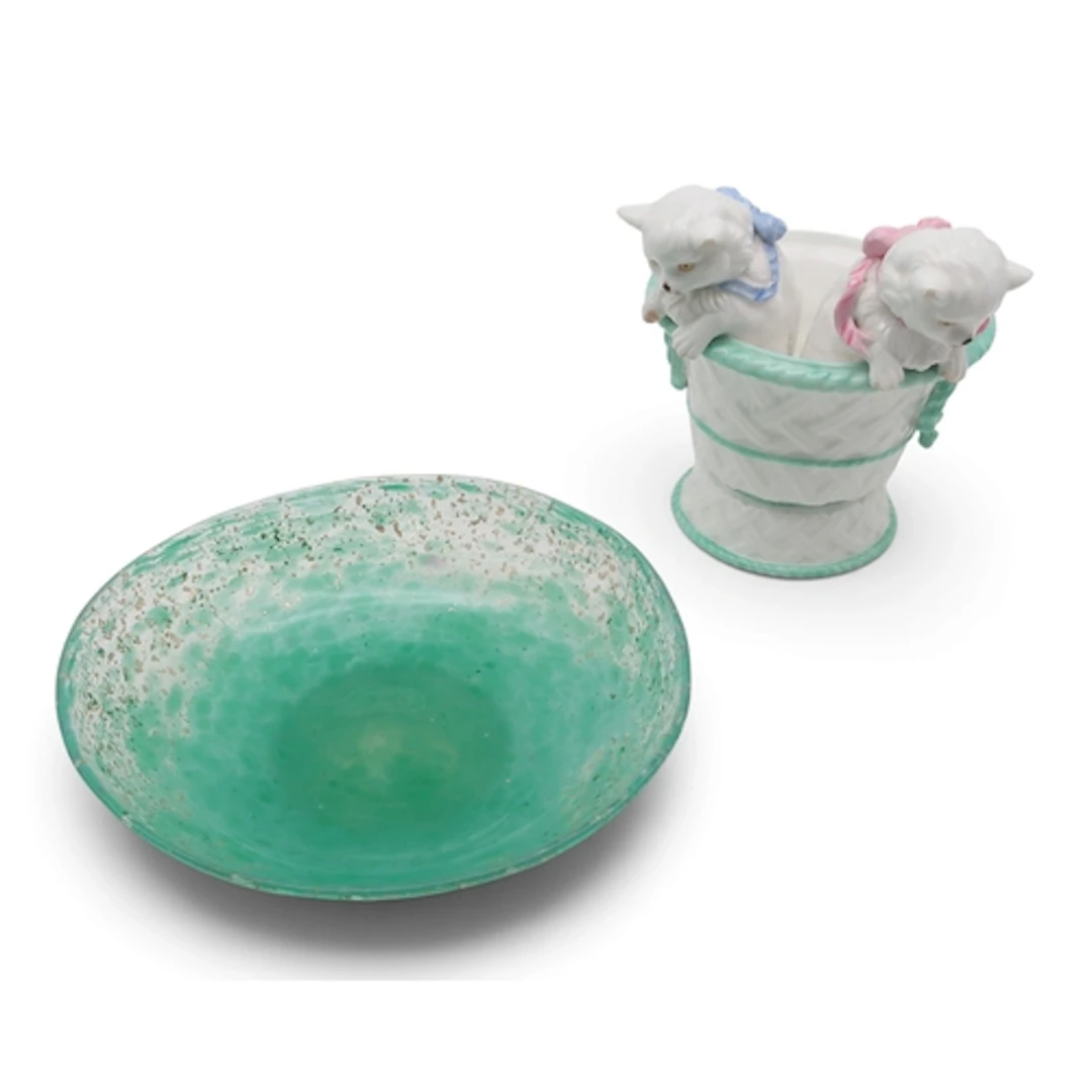 A Vasart green glass bowl with silver mica together with a c...