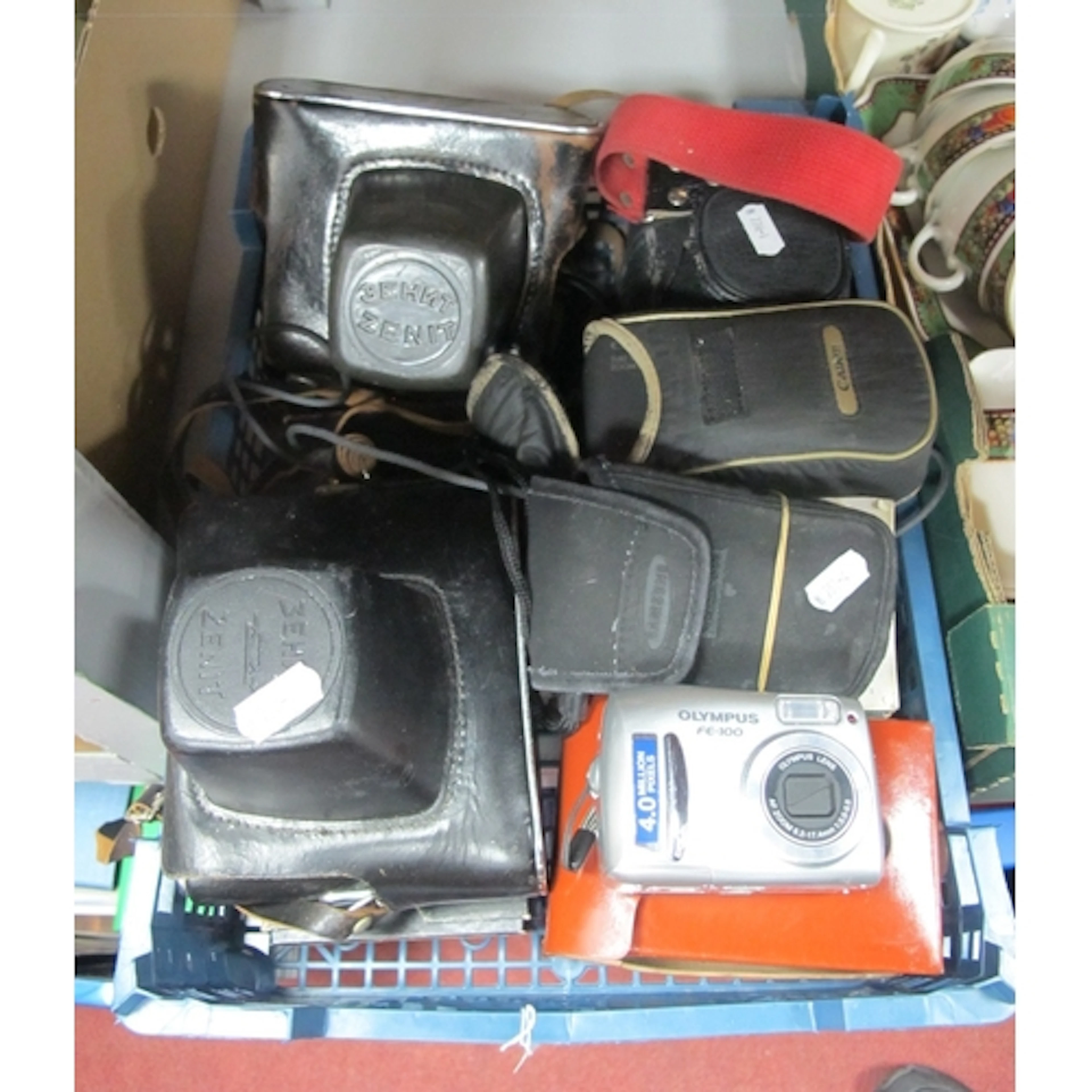Mixed cameras, including Zenit and Pentax SLR cameras, Kodak...