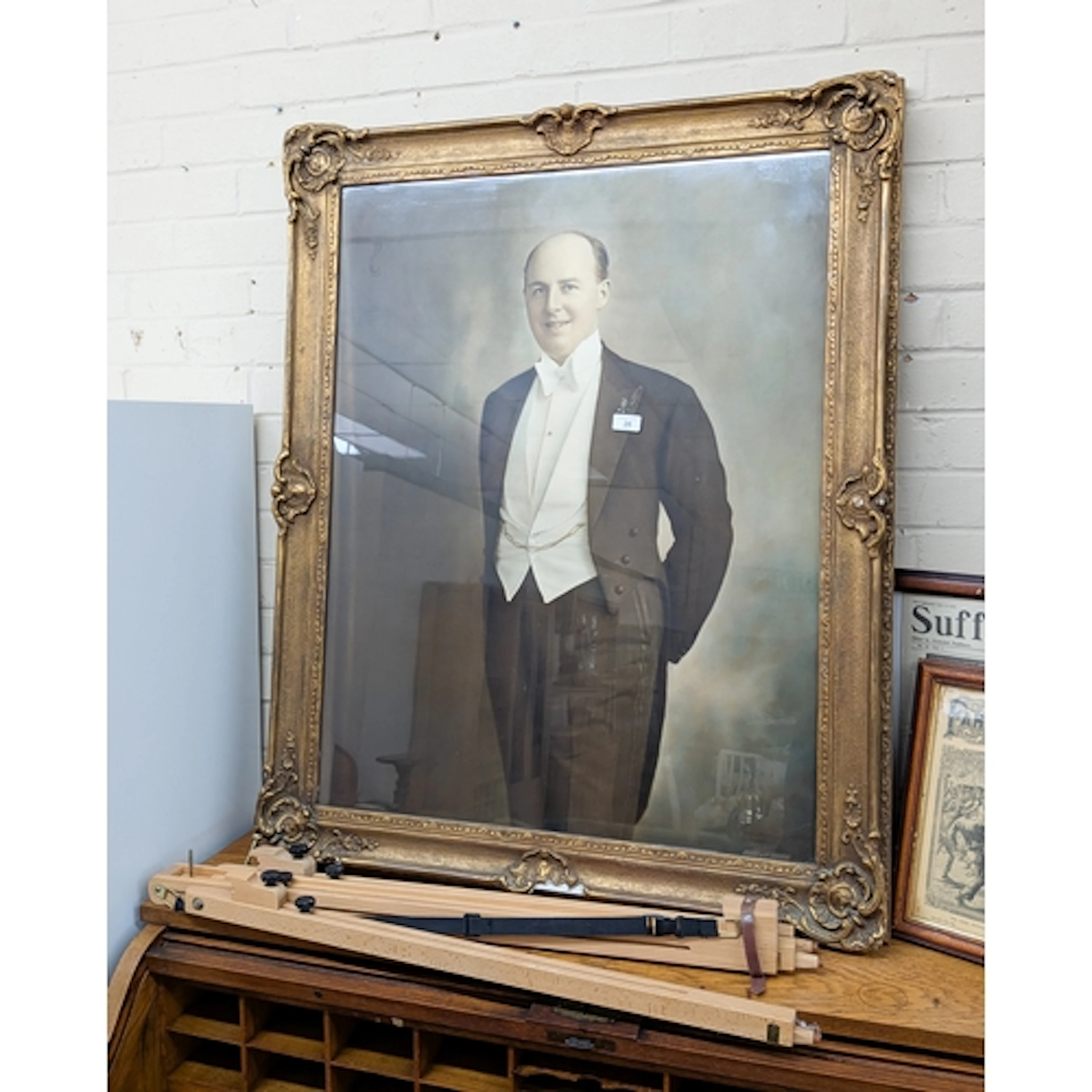 A gilt framed coloured photograph portrait print together wi...