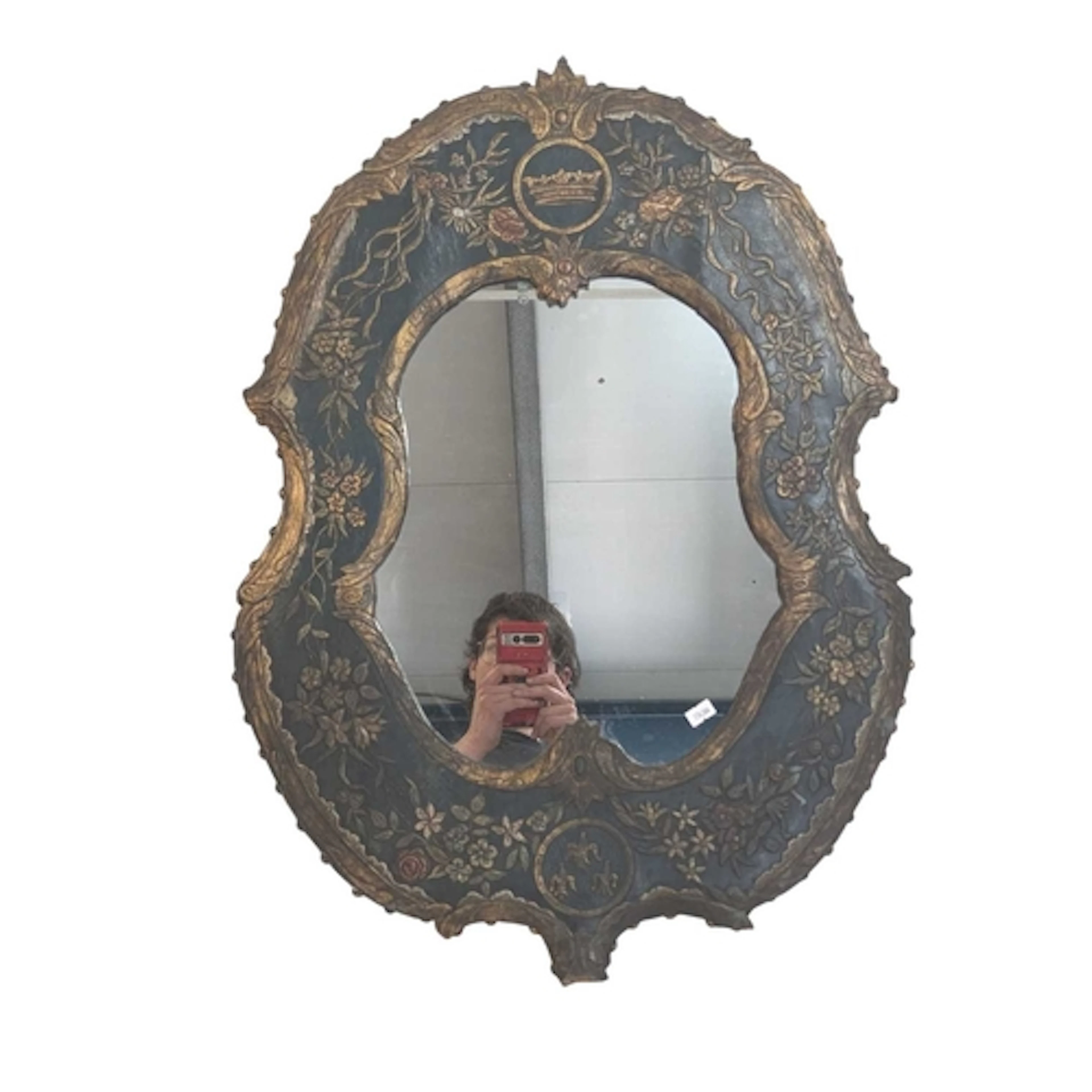 An early 20th century lacquered Georgian style wall mirror. ...