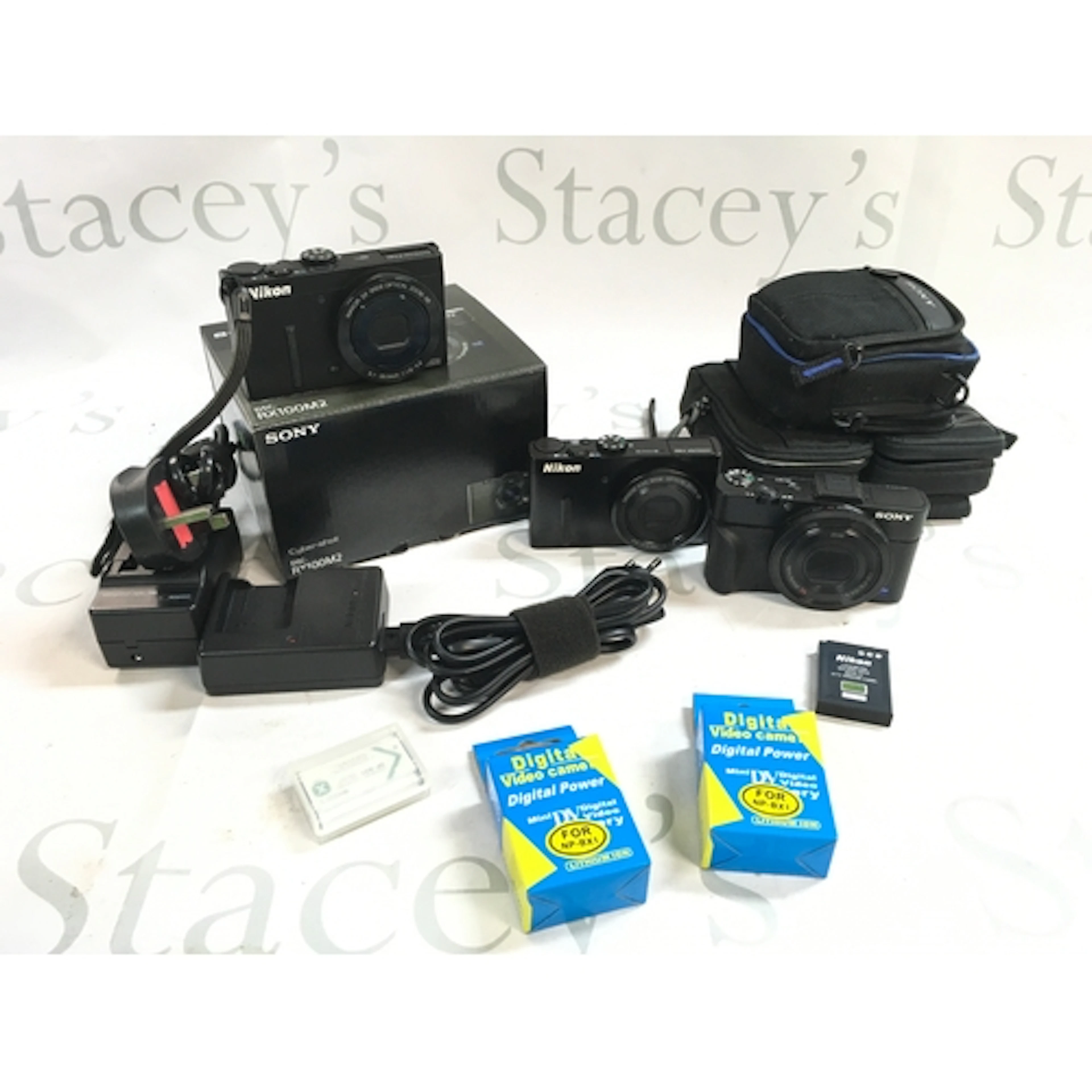 Nikon Coolpix P340, Nikon Coolpix P300, Sony RX100 II. Seen ...