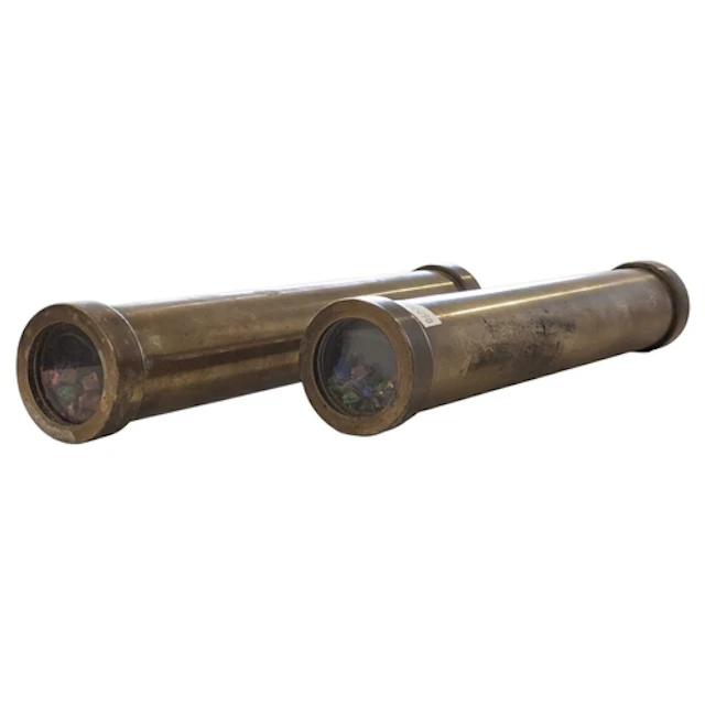 Two 20th century brass kaleidoscopes. Each having tubular br...
