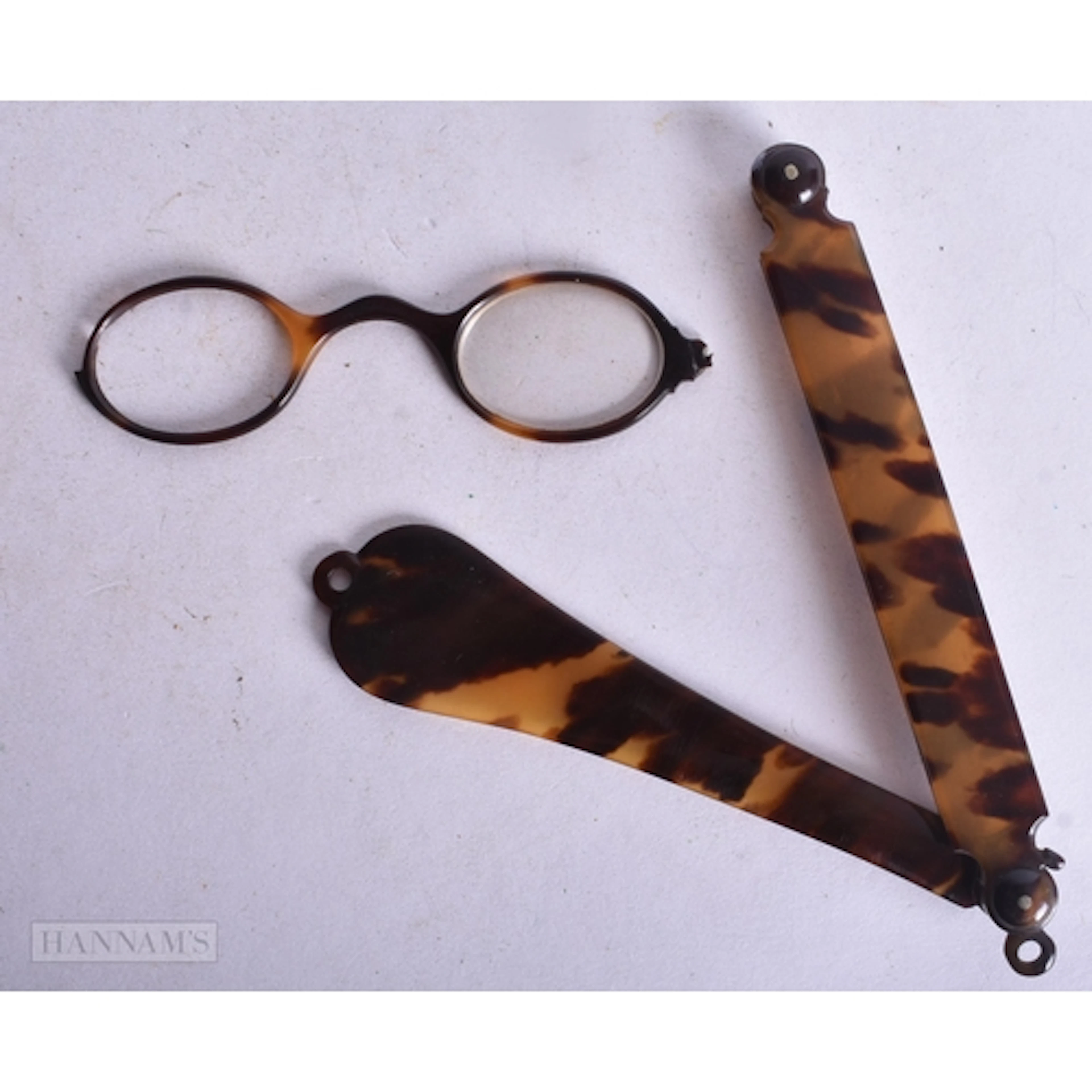 A PAIR OF TORTOISESHELL LORGNETTE. 12 cm x 10 cm.
