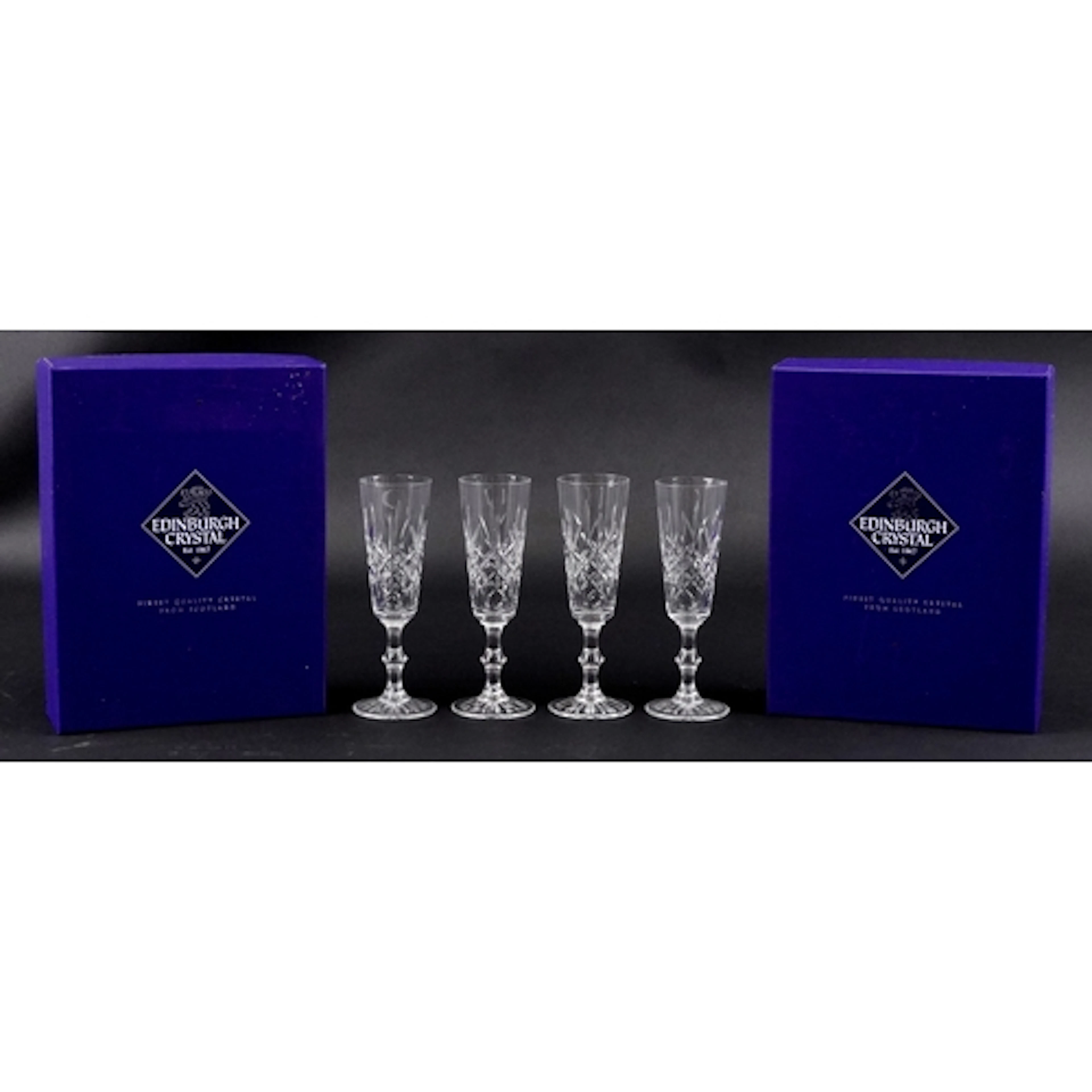 Set of four Edinburgh crystal Champagne flutes with display ...
