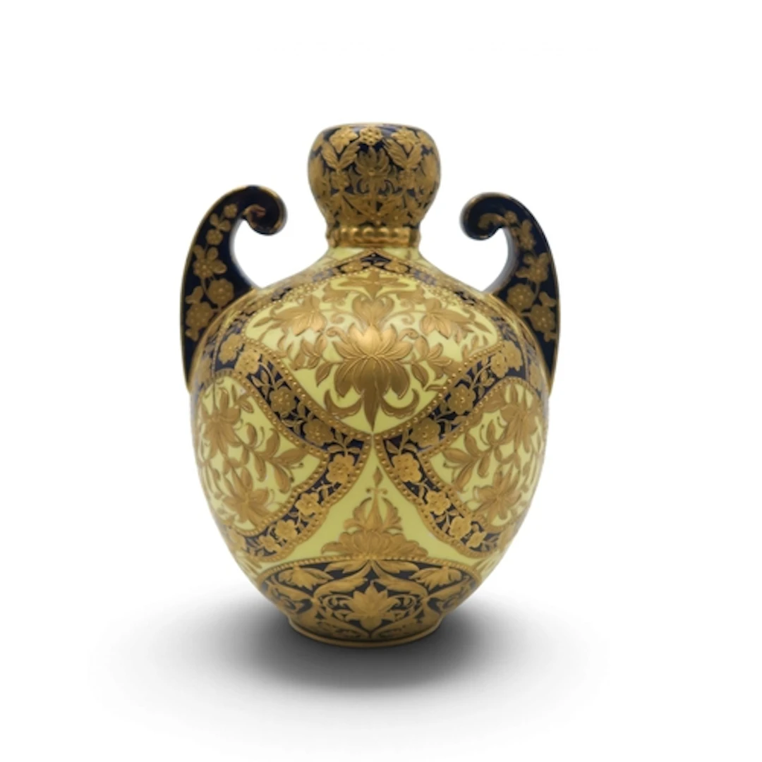 A Derby yellow ground baluster two handled vase with blue ba...