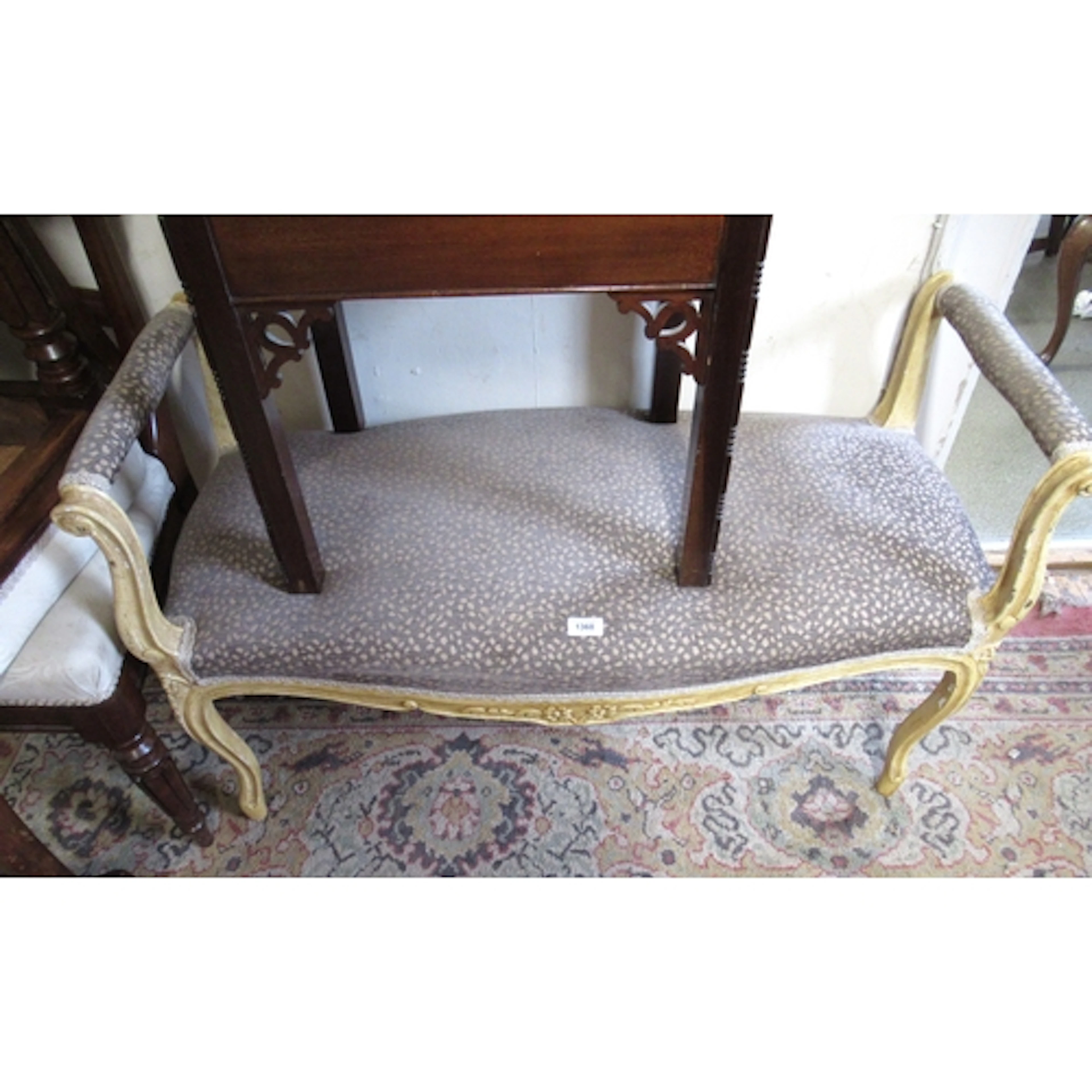 French style two seat bench, having floral carved decoration...