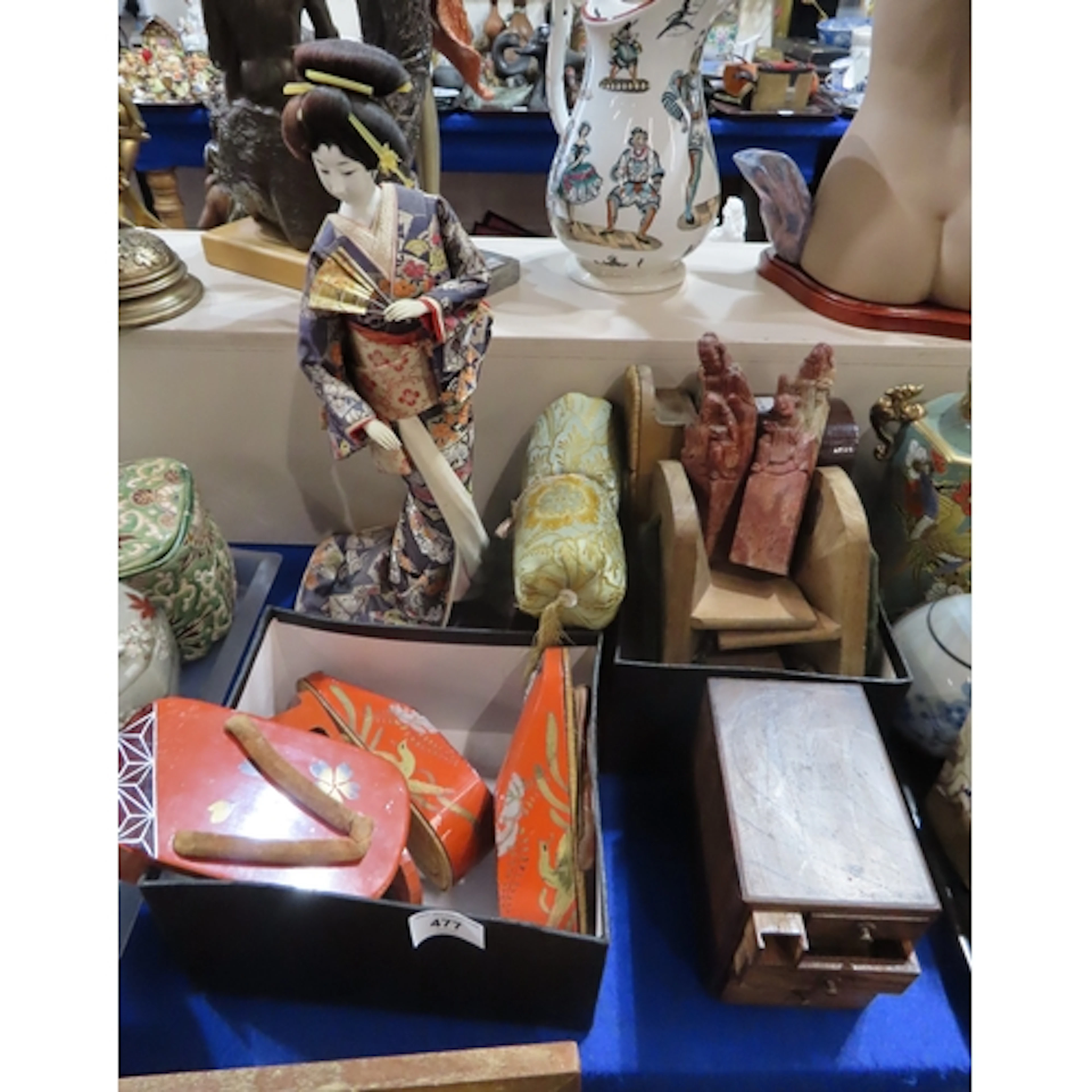A collection of Japanese geta sandals, a lacquer example, a ...