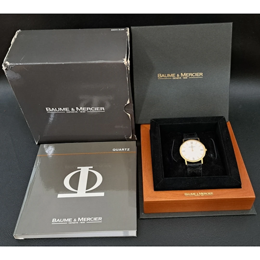 BOXED BAUME & MERCIER EIGHTEEN CARAT GOLD CASED CLASSIMA MV0...
