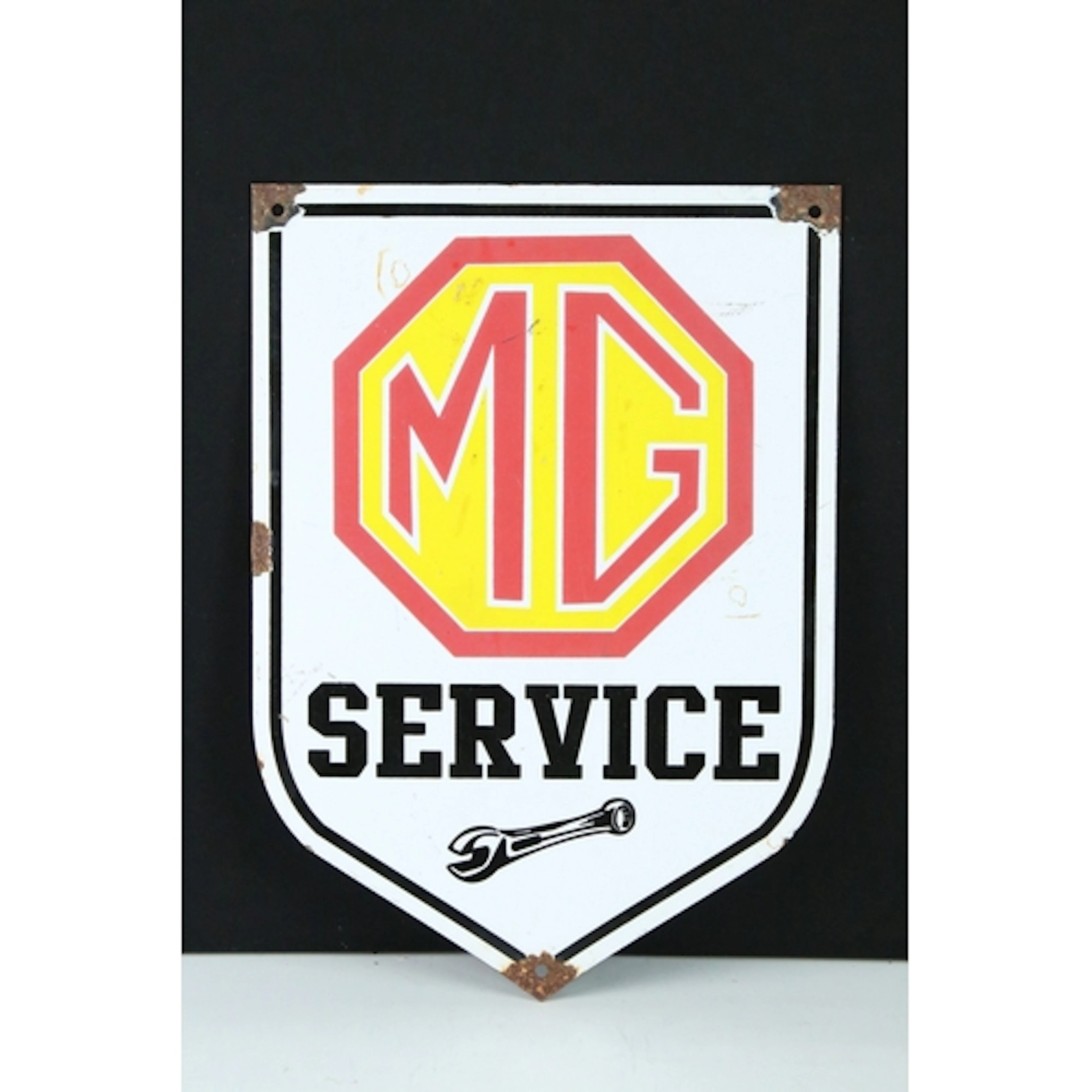 MG Service shield shaped enamelled sign, 35.5cm high x 25.5c...