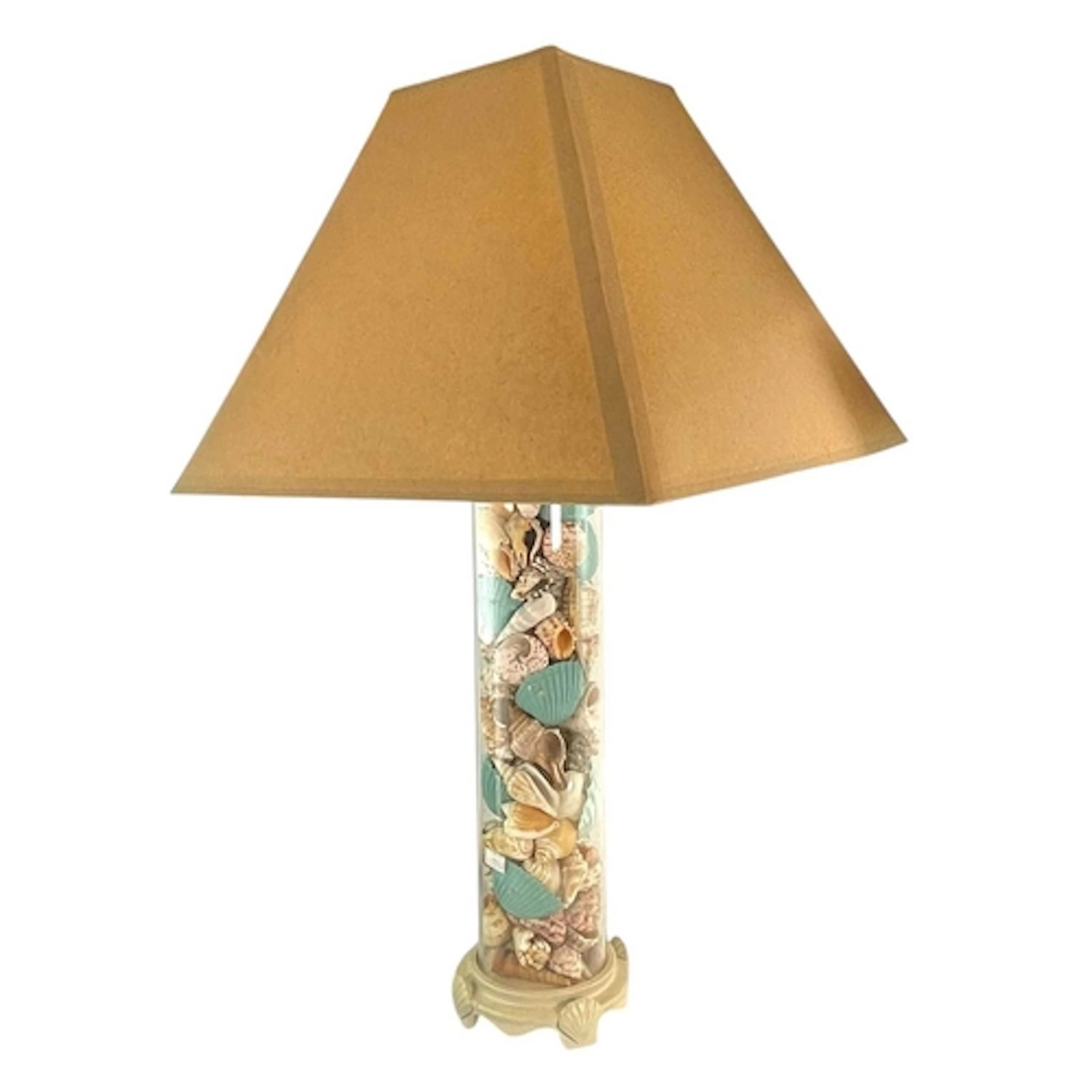 A mid century retro shell lamp light. The tubular clear plas...