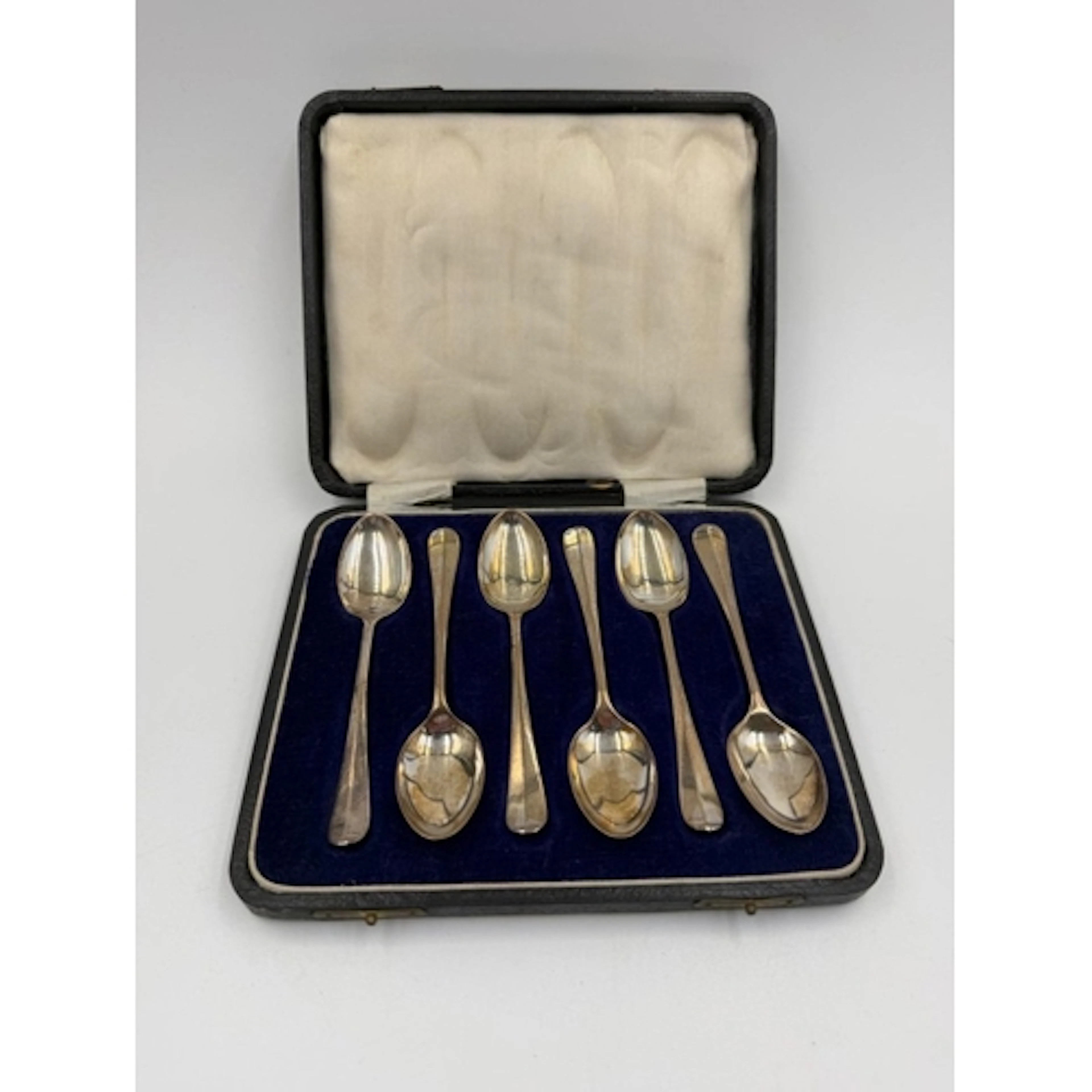A boxed set of six silver teaspoons by Cooper Brothers &...