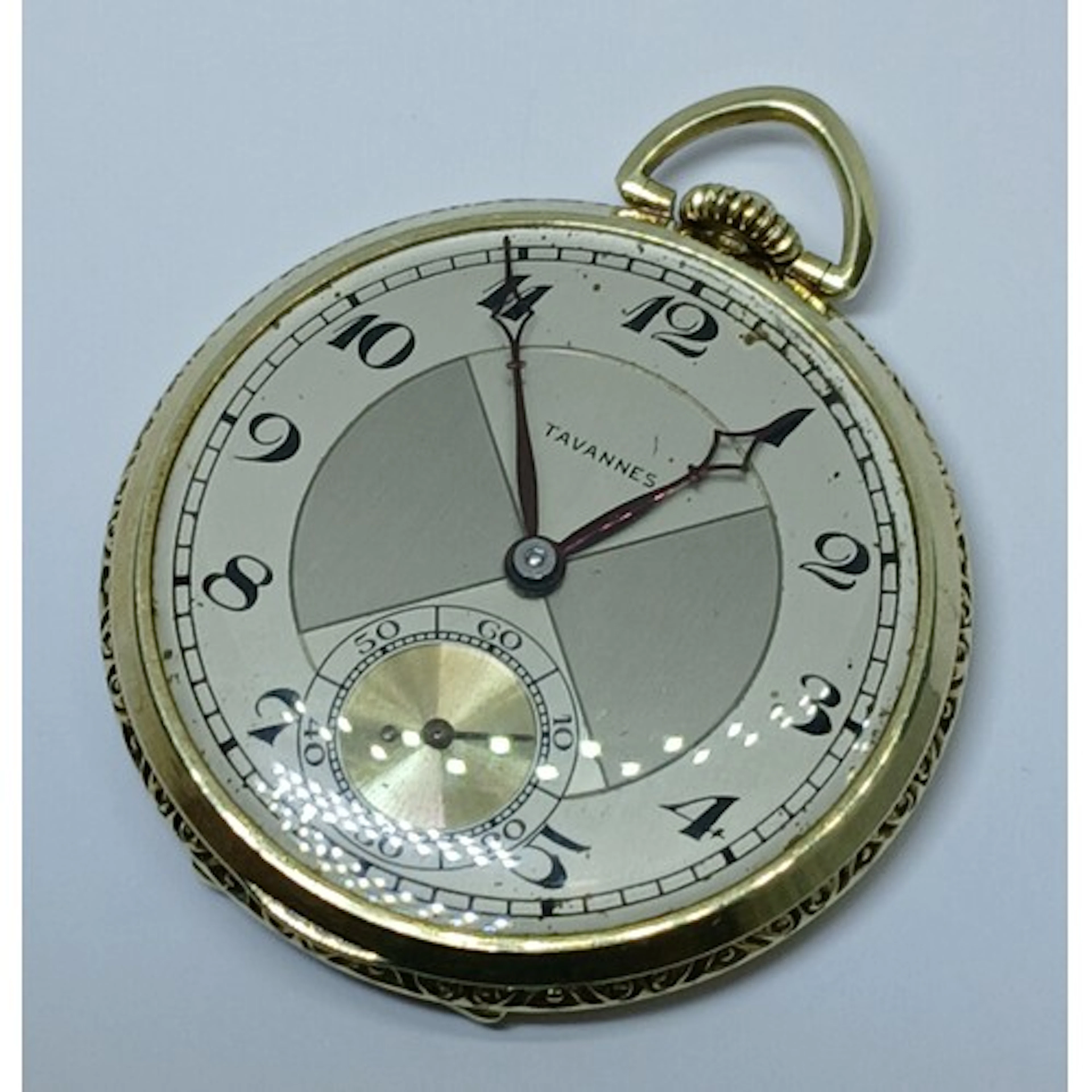 A gold plated Tavannes Art Deco style pocket watch.