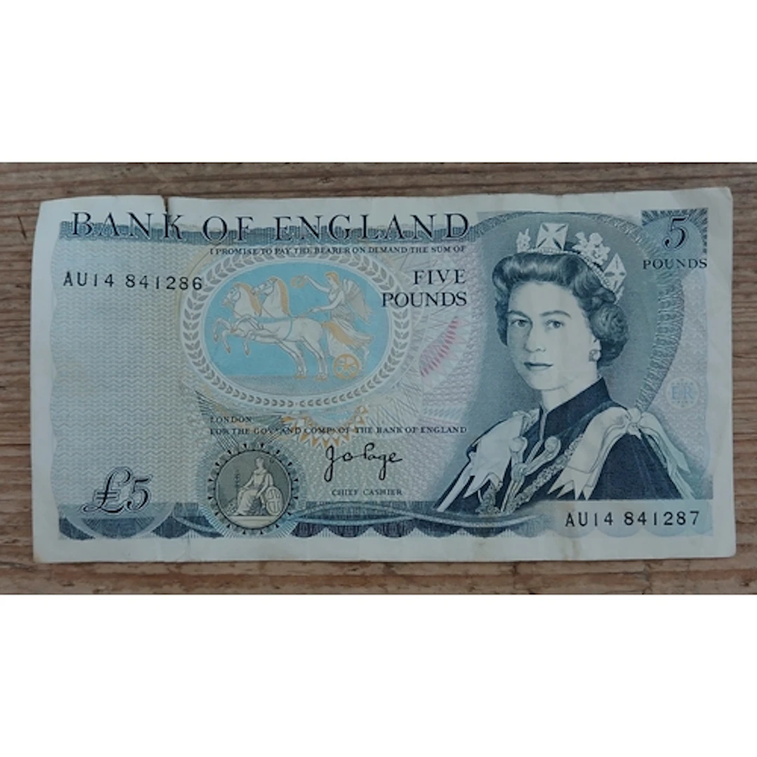 Bank of England five pound error note with two serial number...