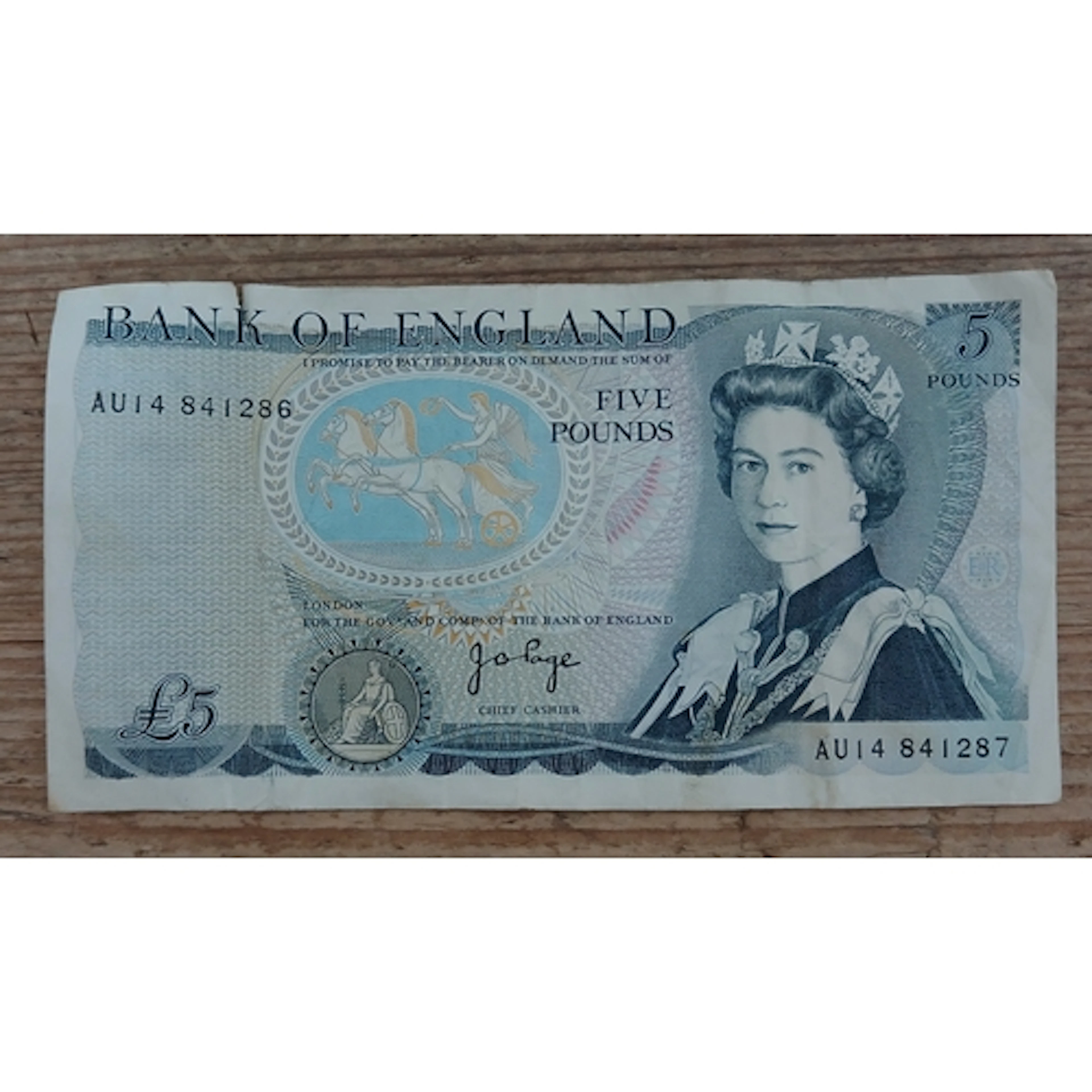 Bank of England five pound error note with two serial number...