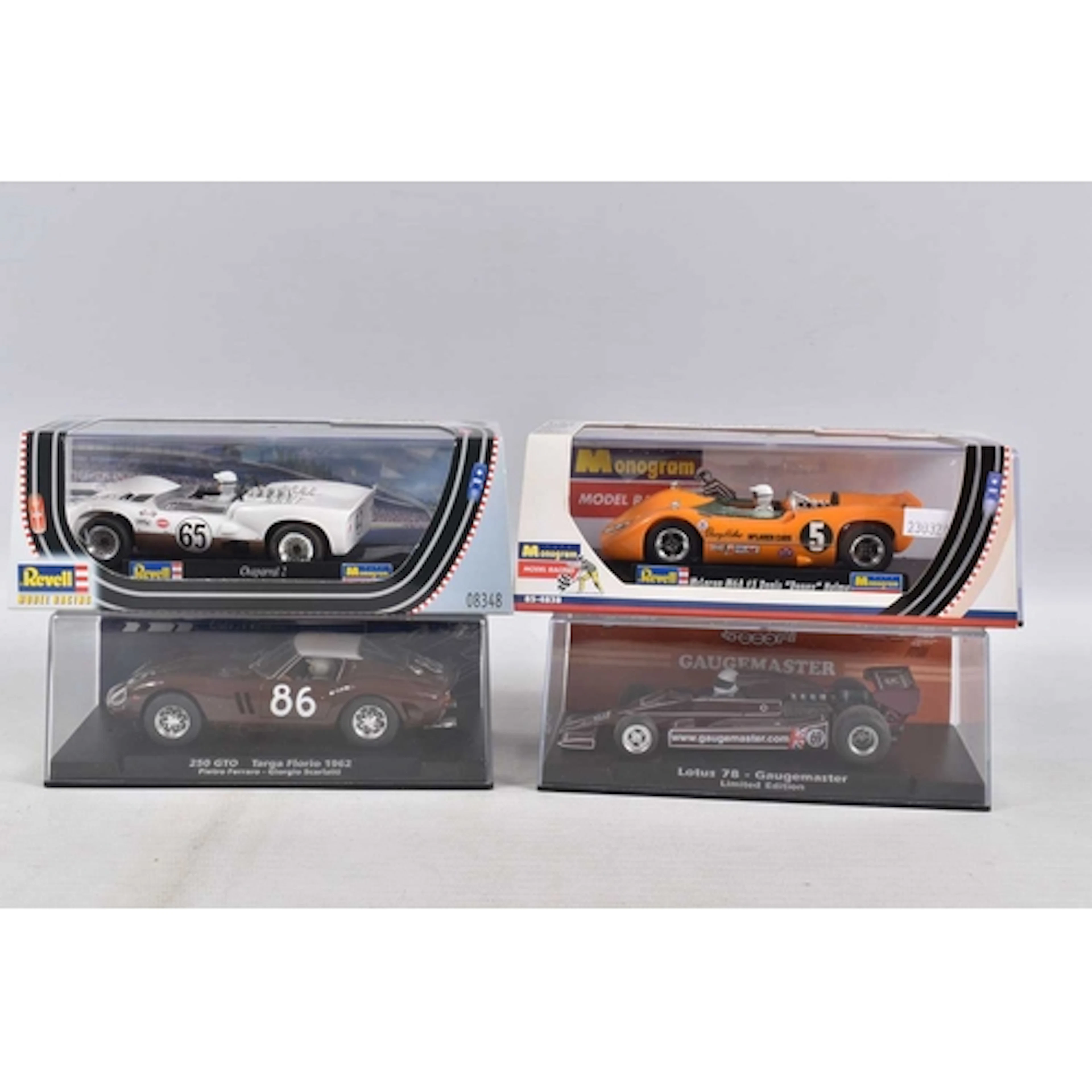 FOUR REBOXED MODEL SLOT CARS FROM REVELL, FLY, AND FLYSLOT, ...