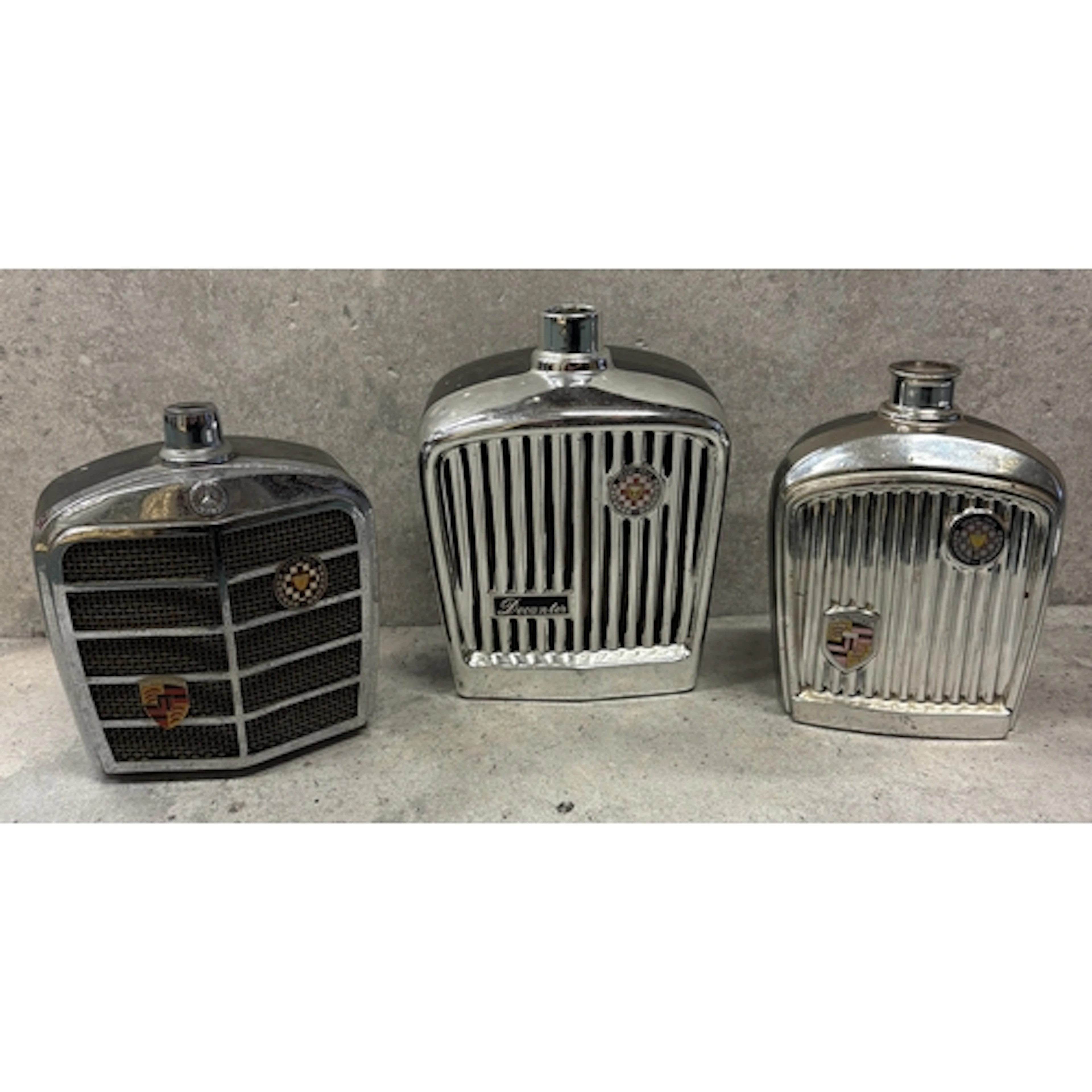 A 1960s decanter in the form of a Jaguar radiator grille tog...
