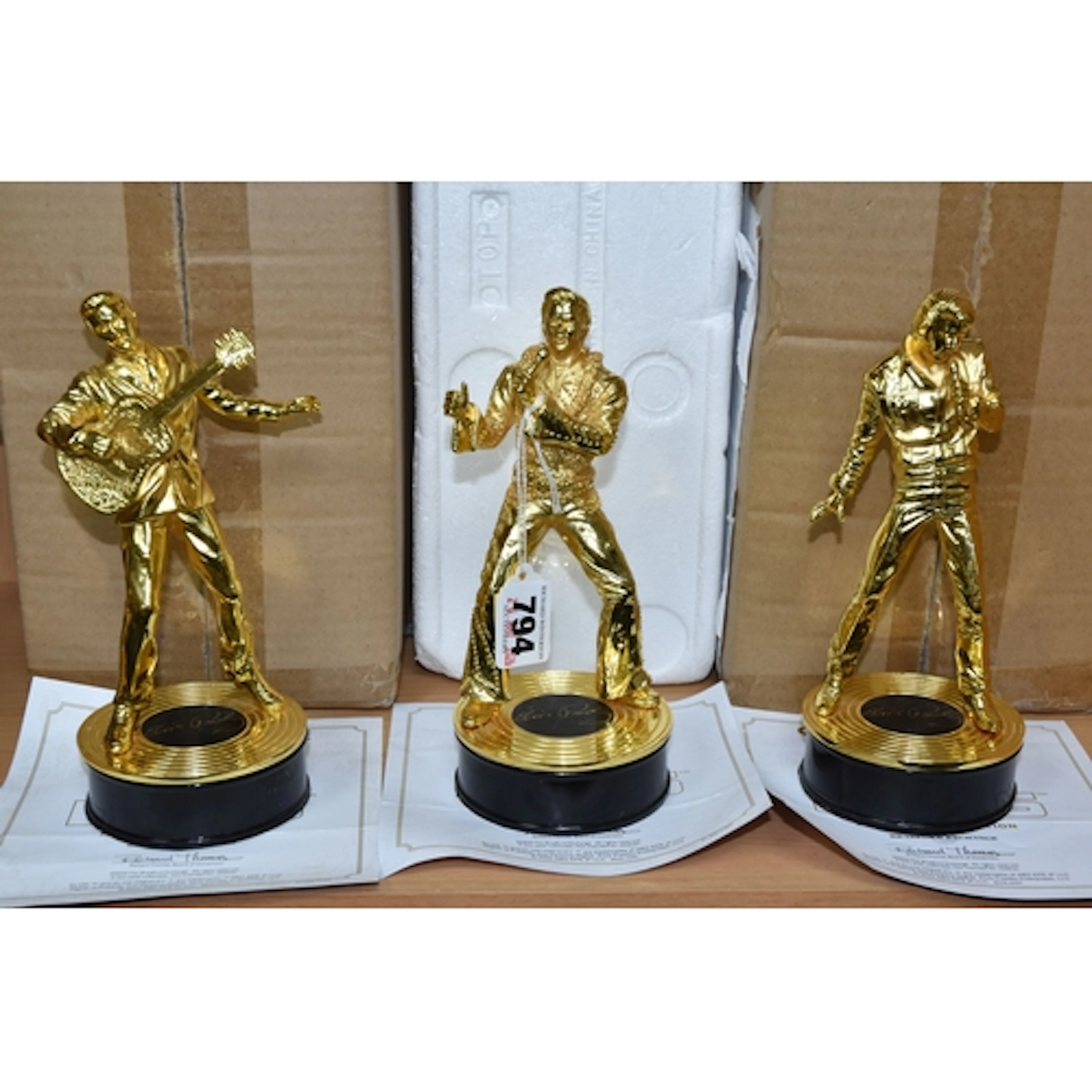 THREE CAST-METAL SCULPTURES OF ELVIS PRESLEY, manufactured i...