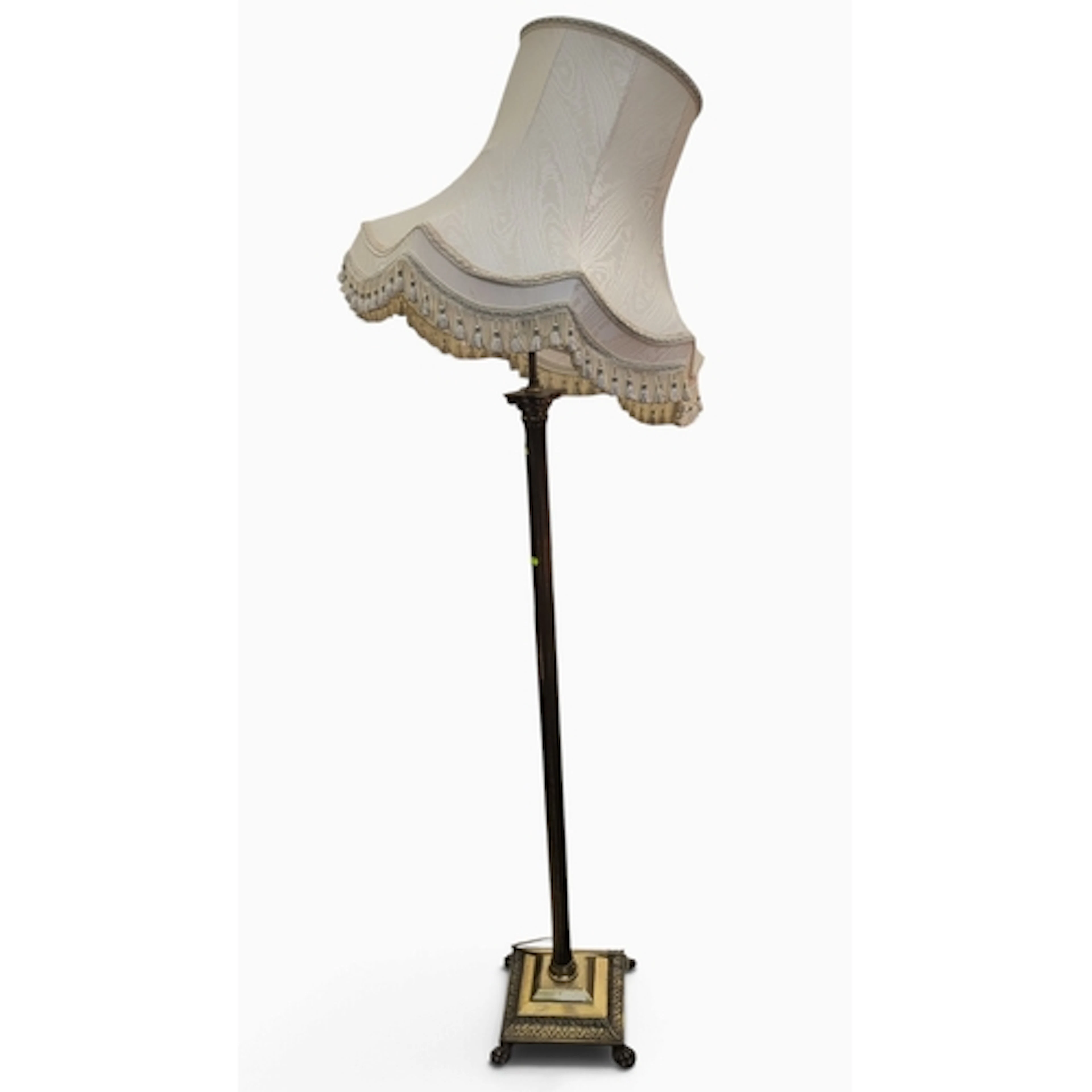 Neoclassical-style floor lamp with a fluted brass-toned colu...