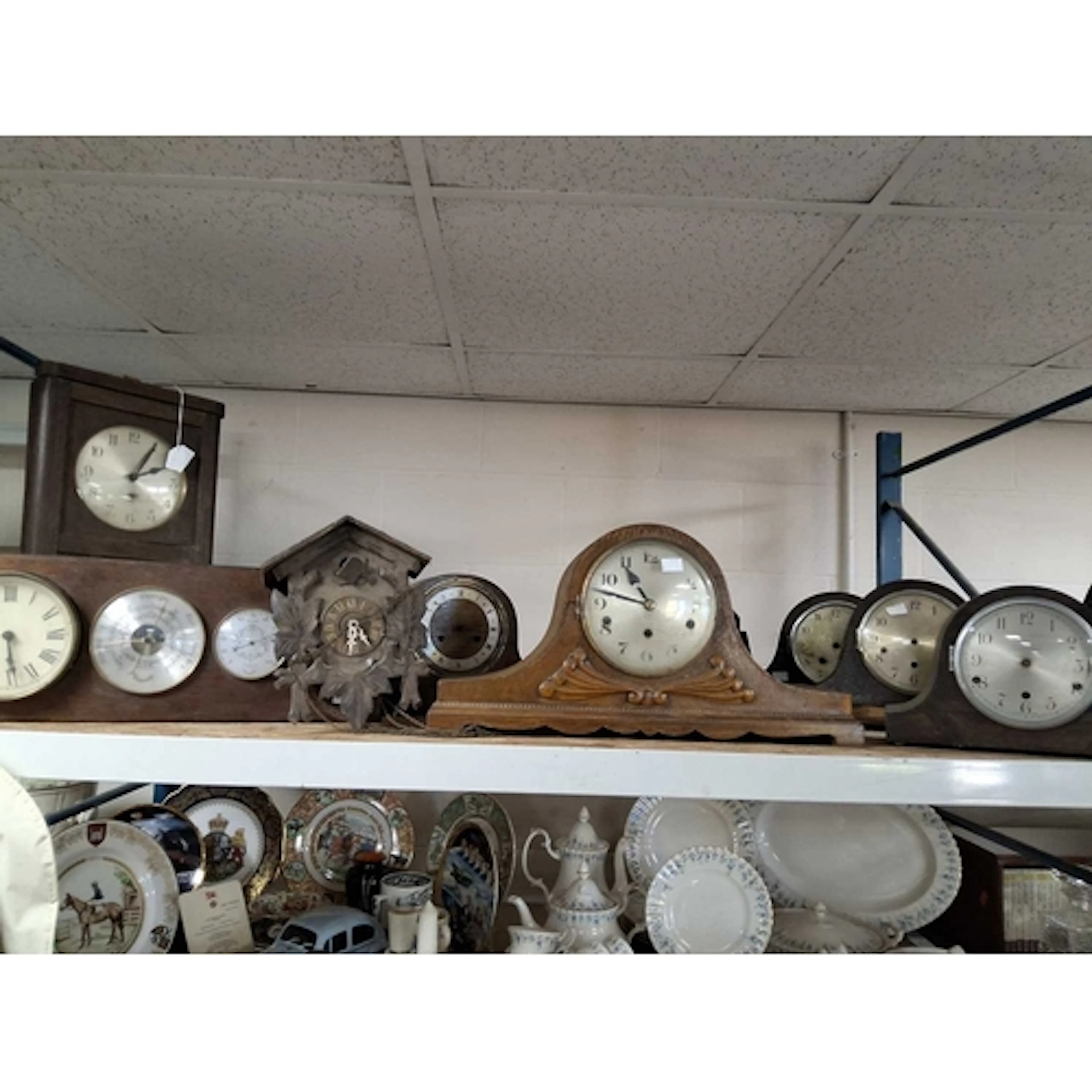 A GROUP OF VINTAGE CLOCKS FOR RESTORATION, comprising three ...