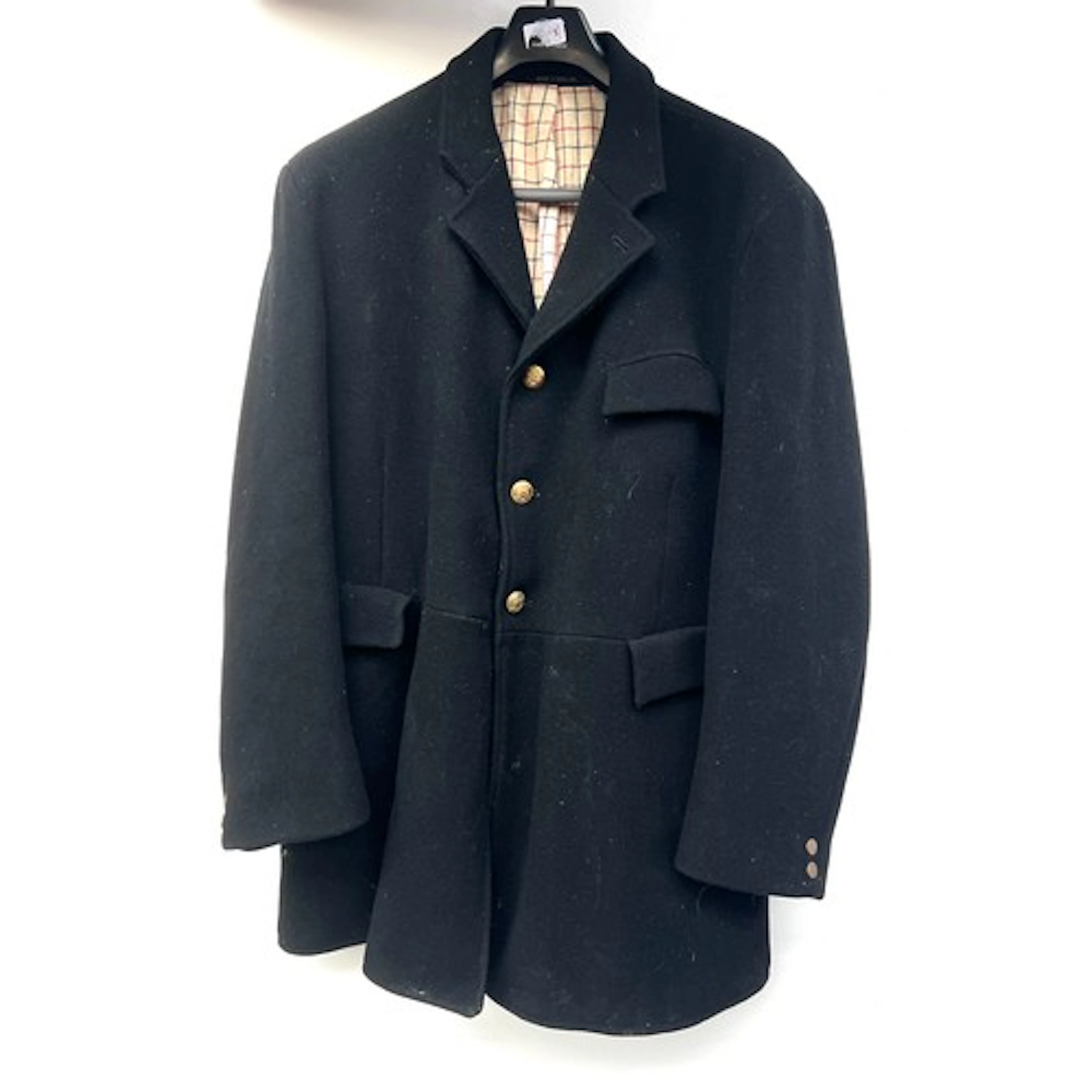A gents black hunt coat in Melton cloth, tattersall check li...