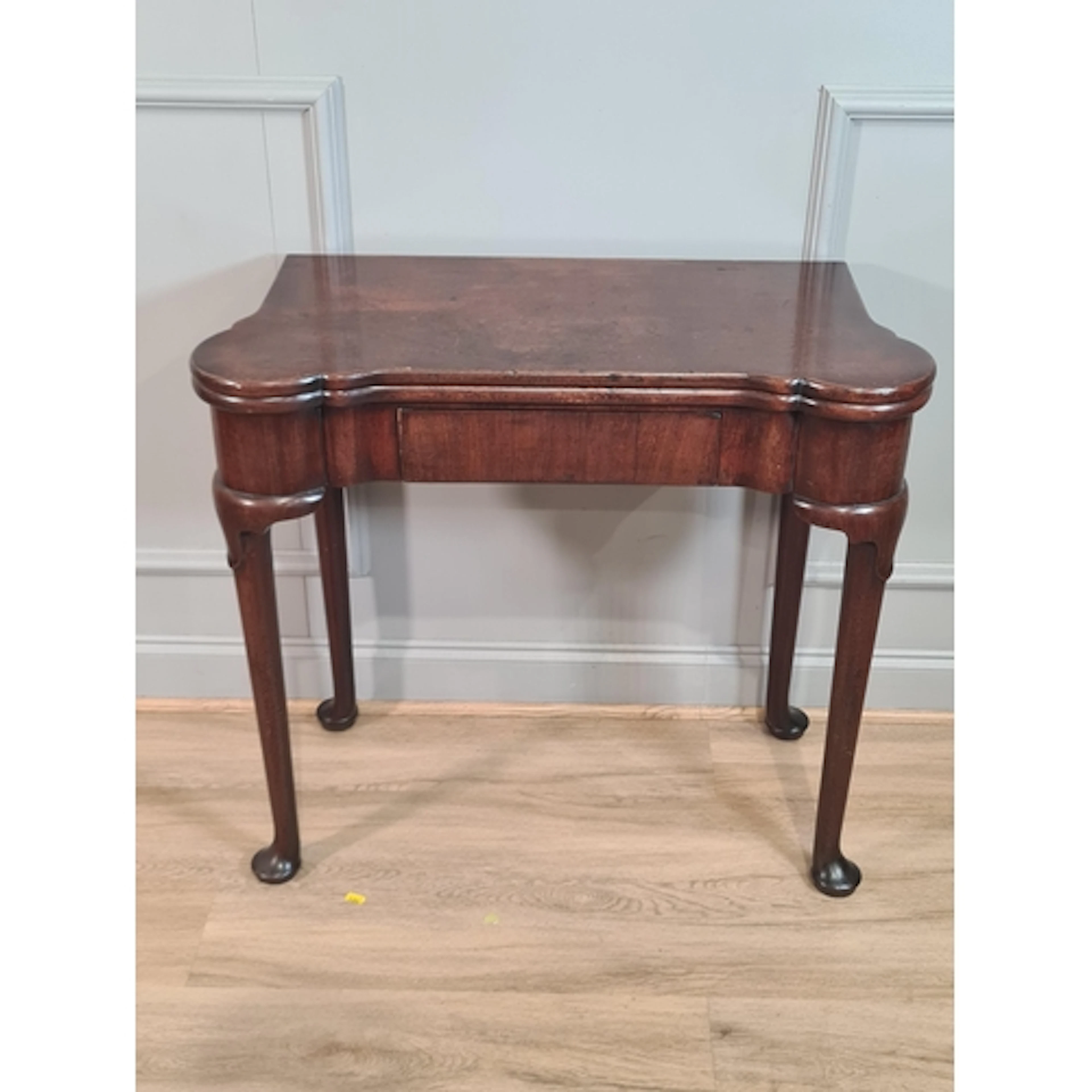 An 18th Century mahogany Card Table, the foldover turret cor...