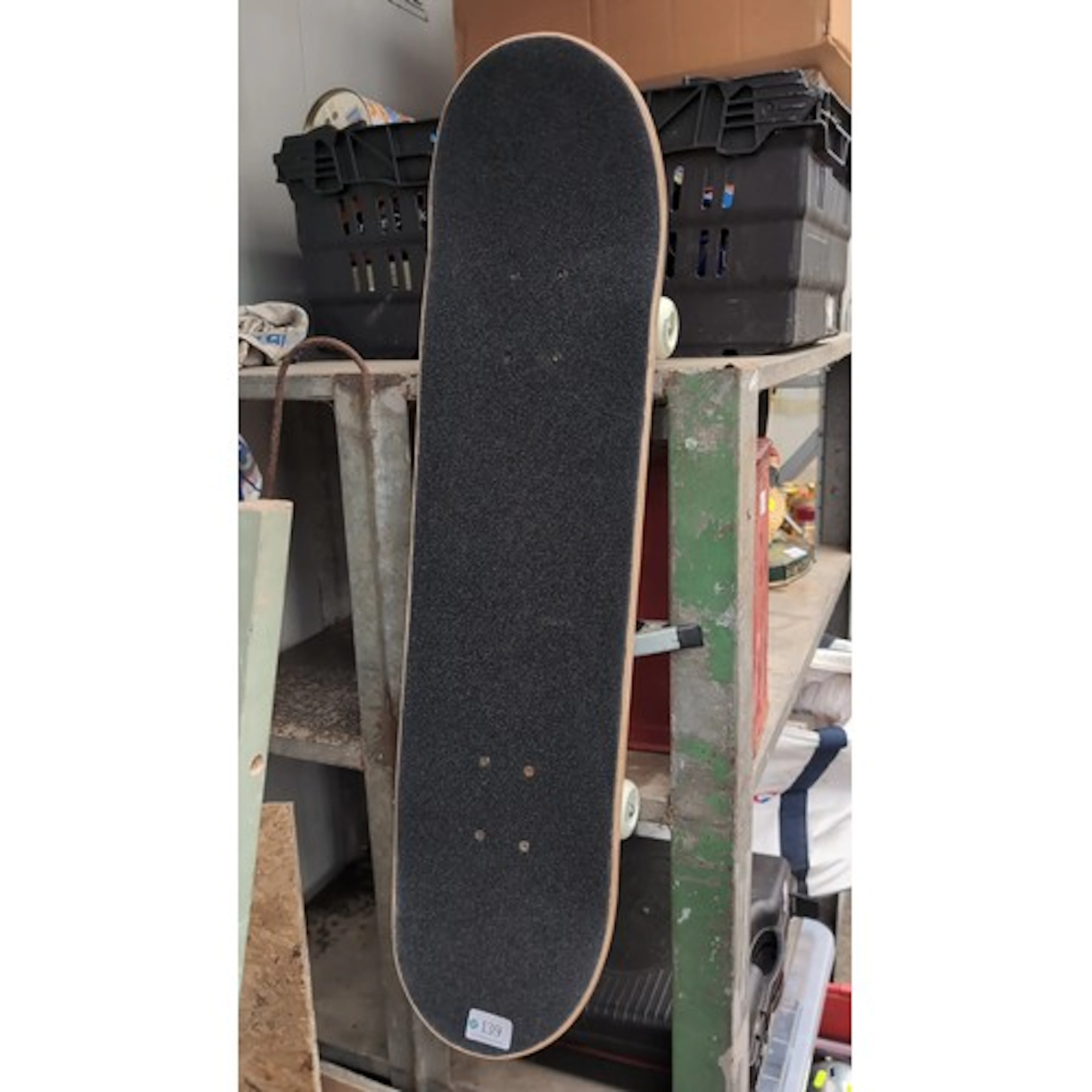 Modern skateboard comprising a natural-finish laminated wood...