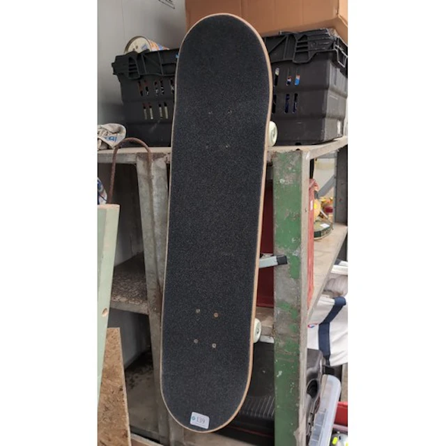 Modern skateboard comprising a natural-finish laminated wood...