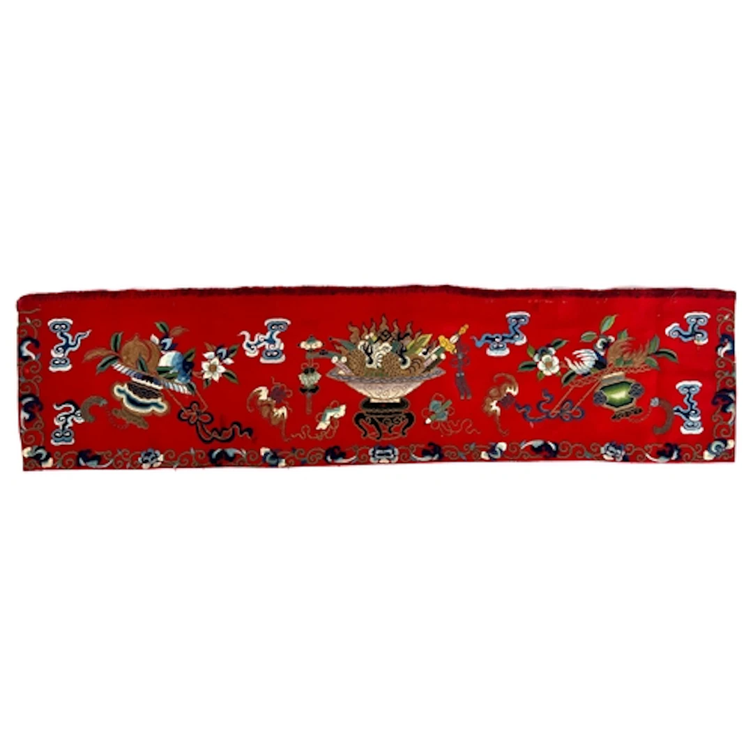 An early 20th century Chinese red wool panel embroidered in ...