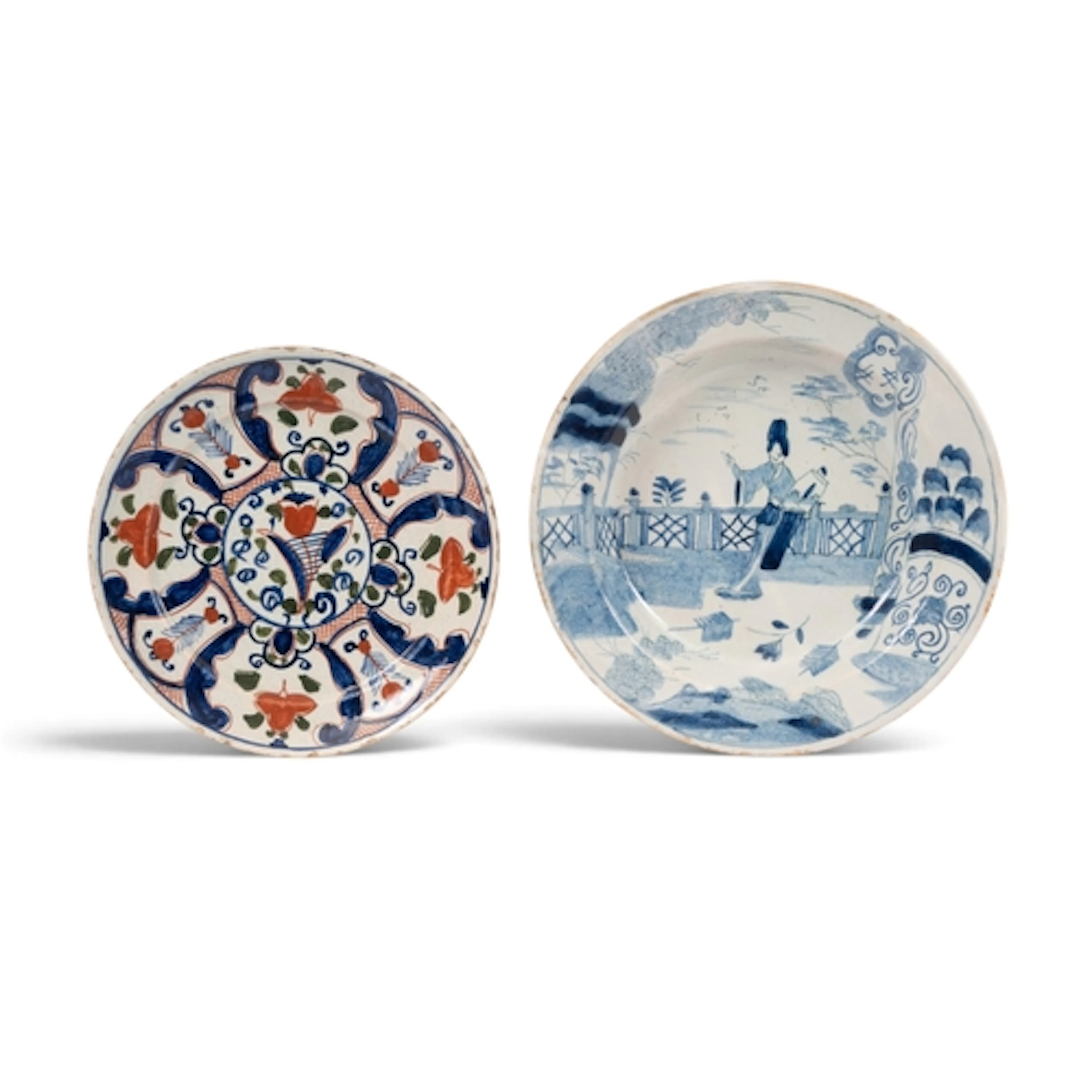 A Bristol delftware plate, c.1720, of pancake shape, painted...